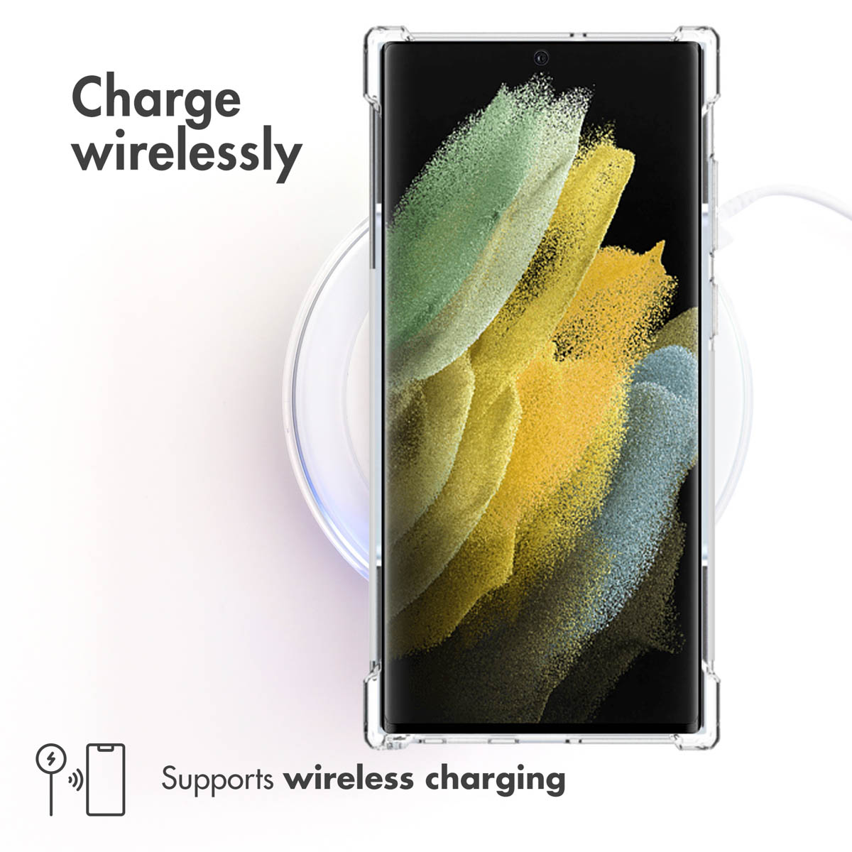 Un smartphone dans une coque transparente sur un chargeur sans fil. Texte : Charge wirelessly.