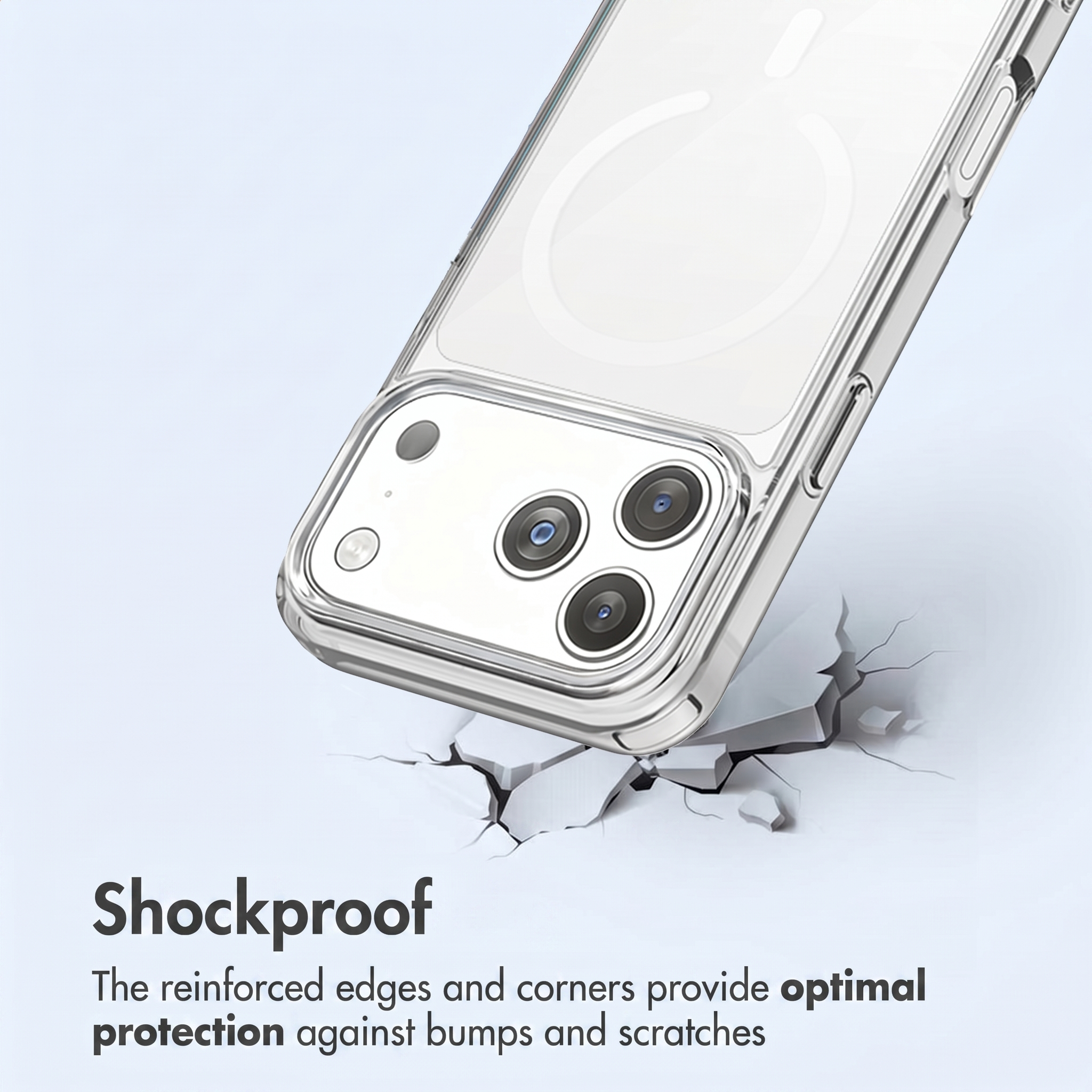 Une coque de téléphone transparente antichoc protège un smartphone frappant une surface fissurée.