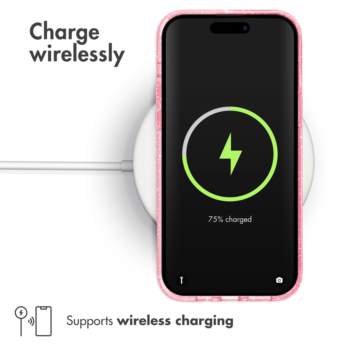 Un teléfono rosa con funda sobre un cargador inalámbrico blanco, muestra 75% de batería y texto de carga.