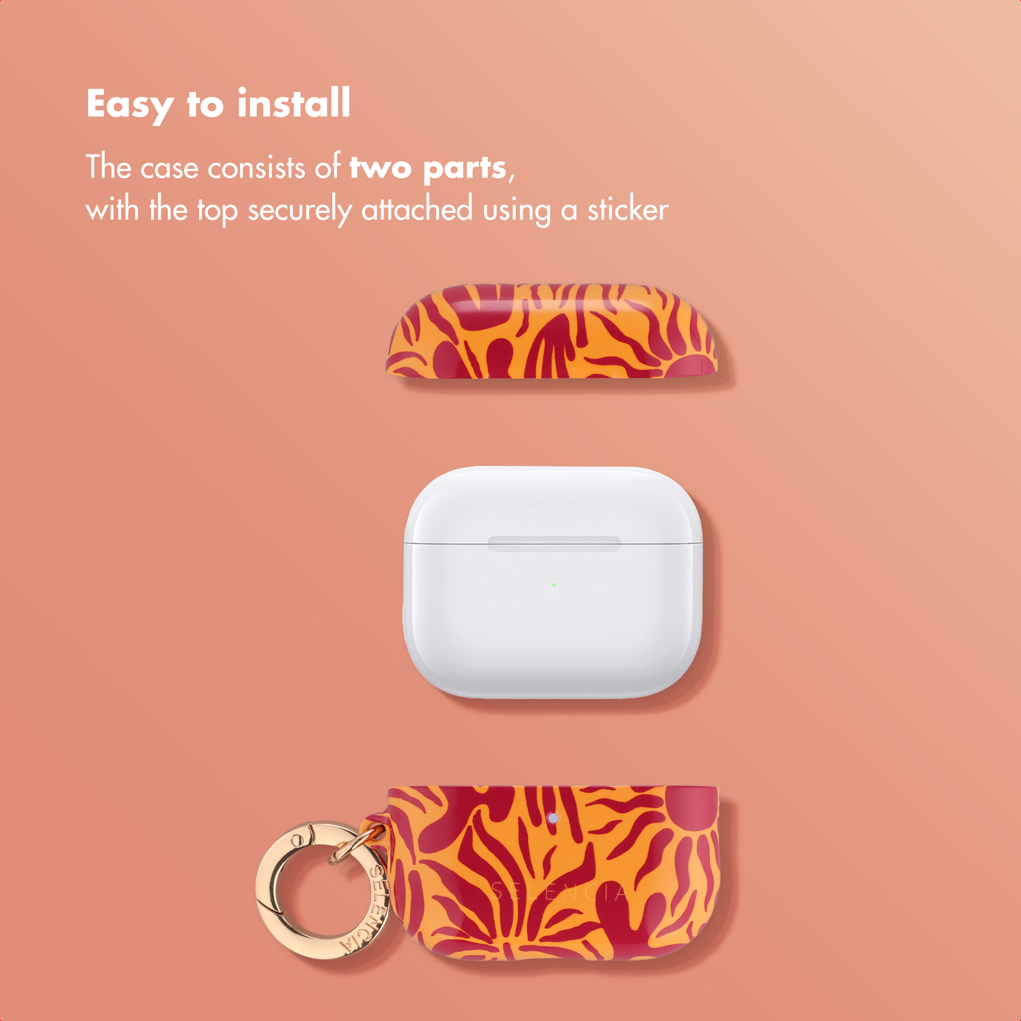 Vista explosionada de una funda de auriculares de dos partes con patrón naranja y rojo y llavero.