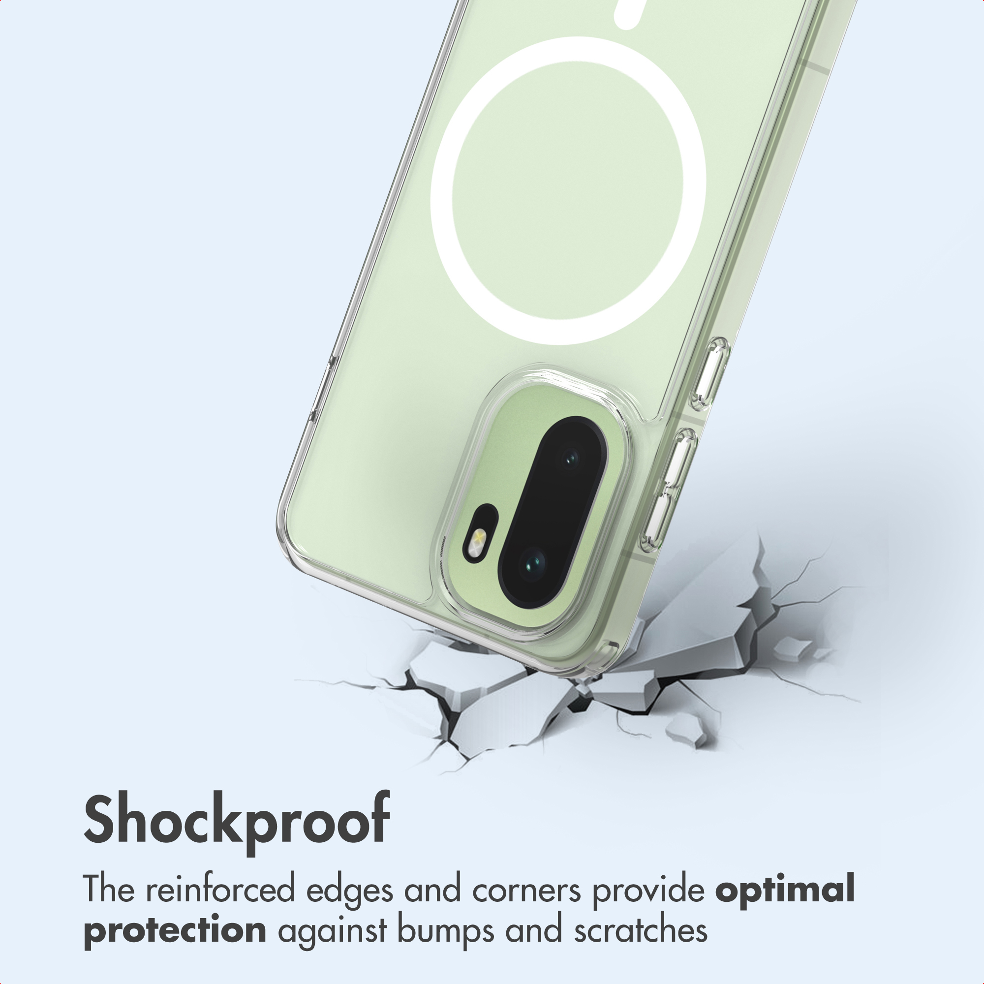 Una funda de teléfono verde claro con un diseño de anillo circular impacta contra una superficie agrietada.