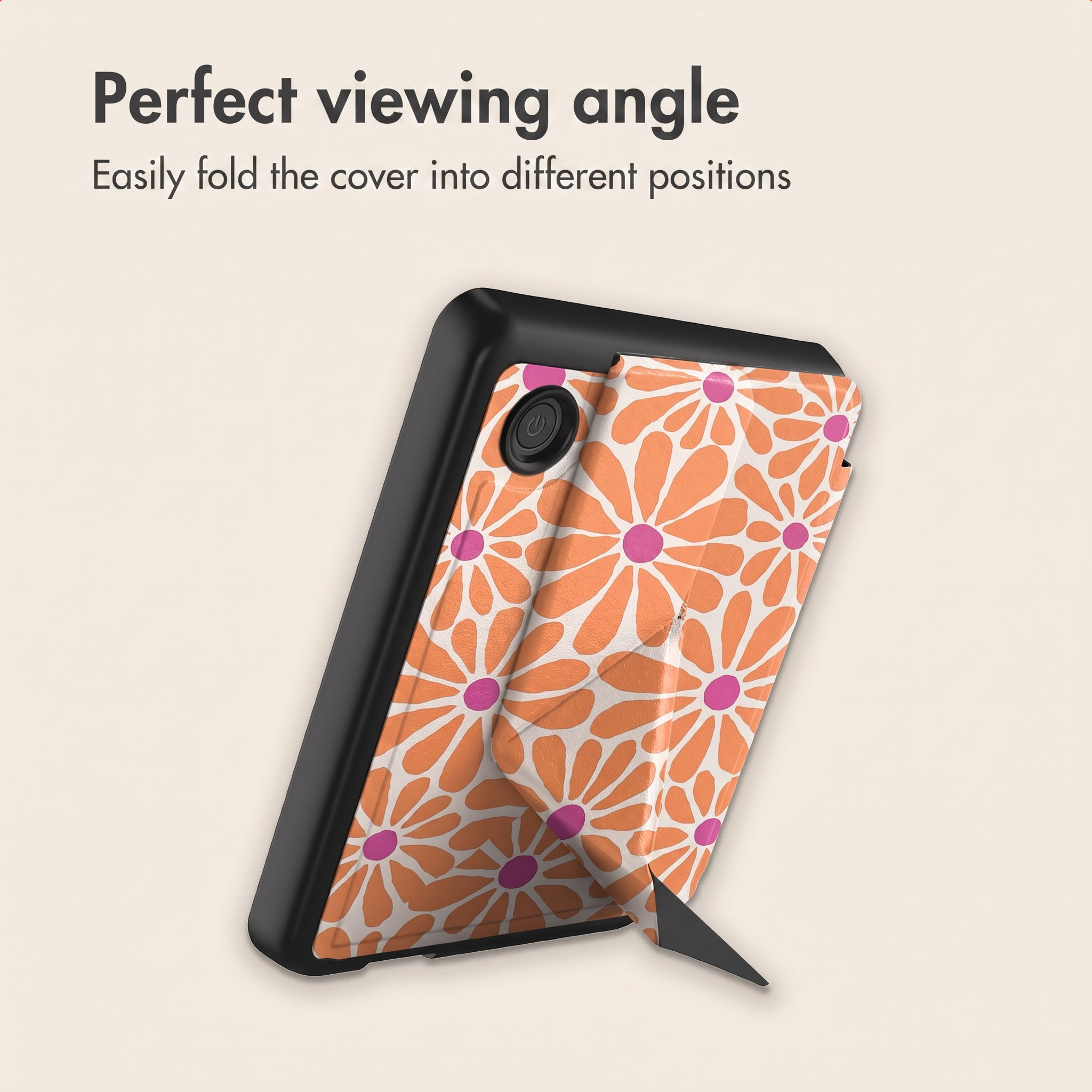 Un étui de tablette pliable avec motif floral orange et support intégré.