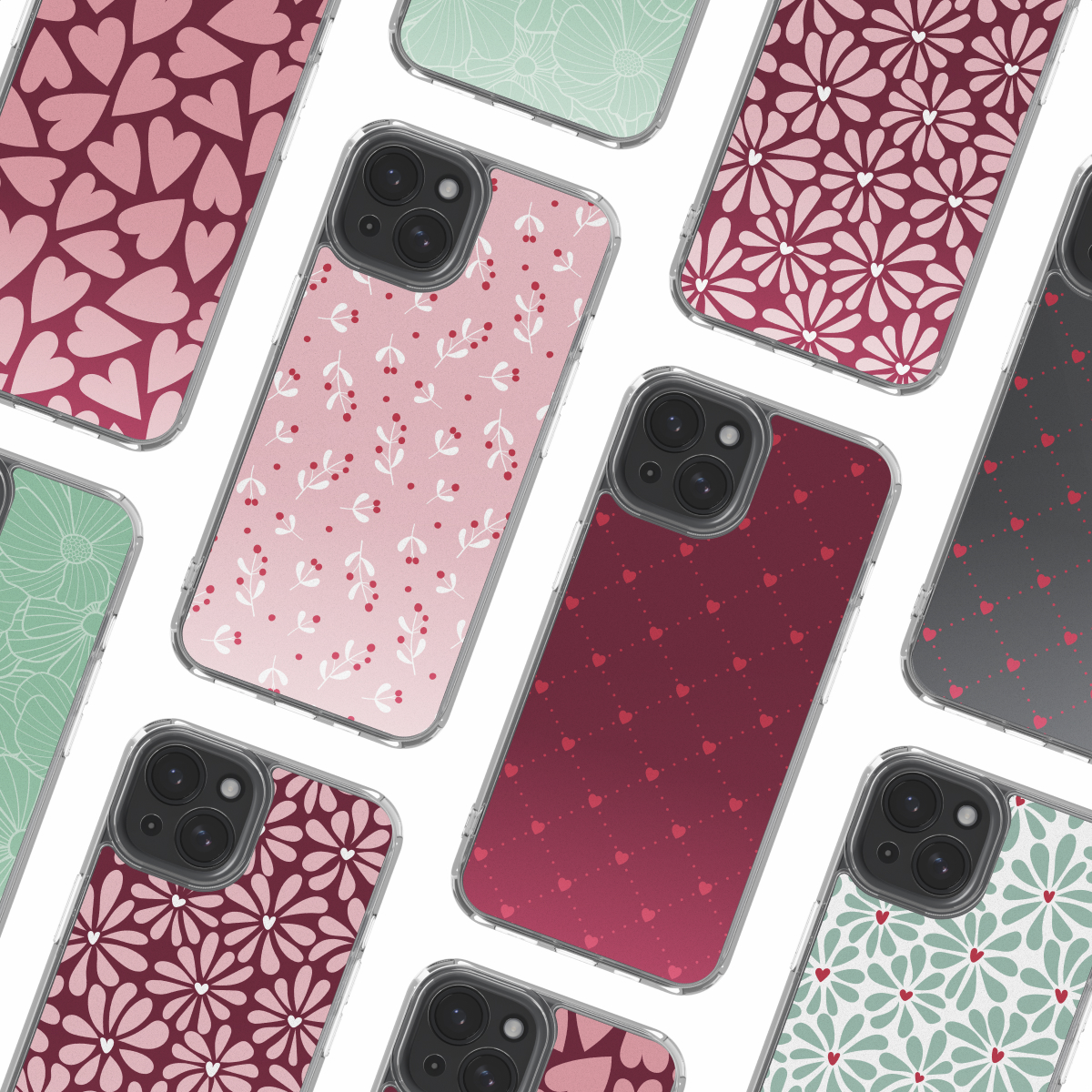 Meerdere smartphones met hoesjes met patronen van harten, bloemen en bessen op een witte achtergrond.