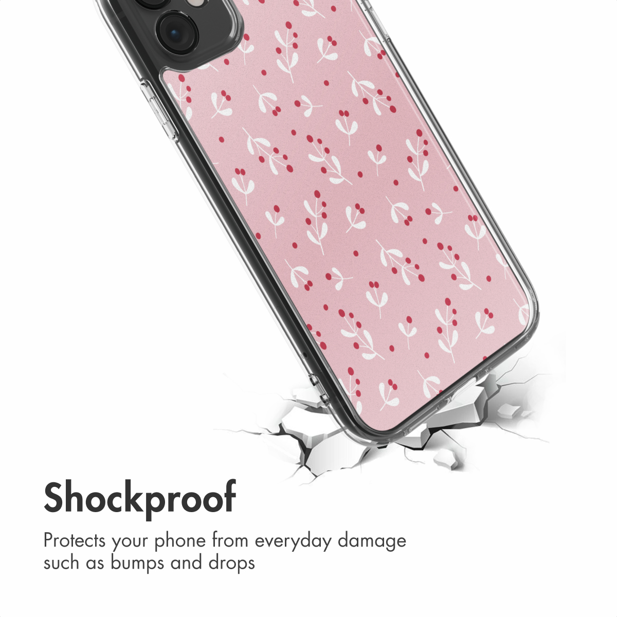 Cover rosa con motivo di foglie bianche e bacche rosse su superficie crepata, con testo 'Shockproof'.