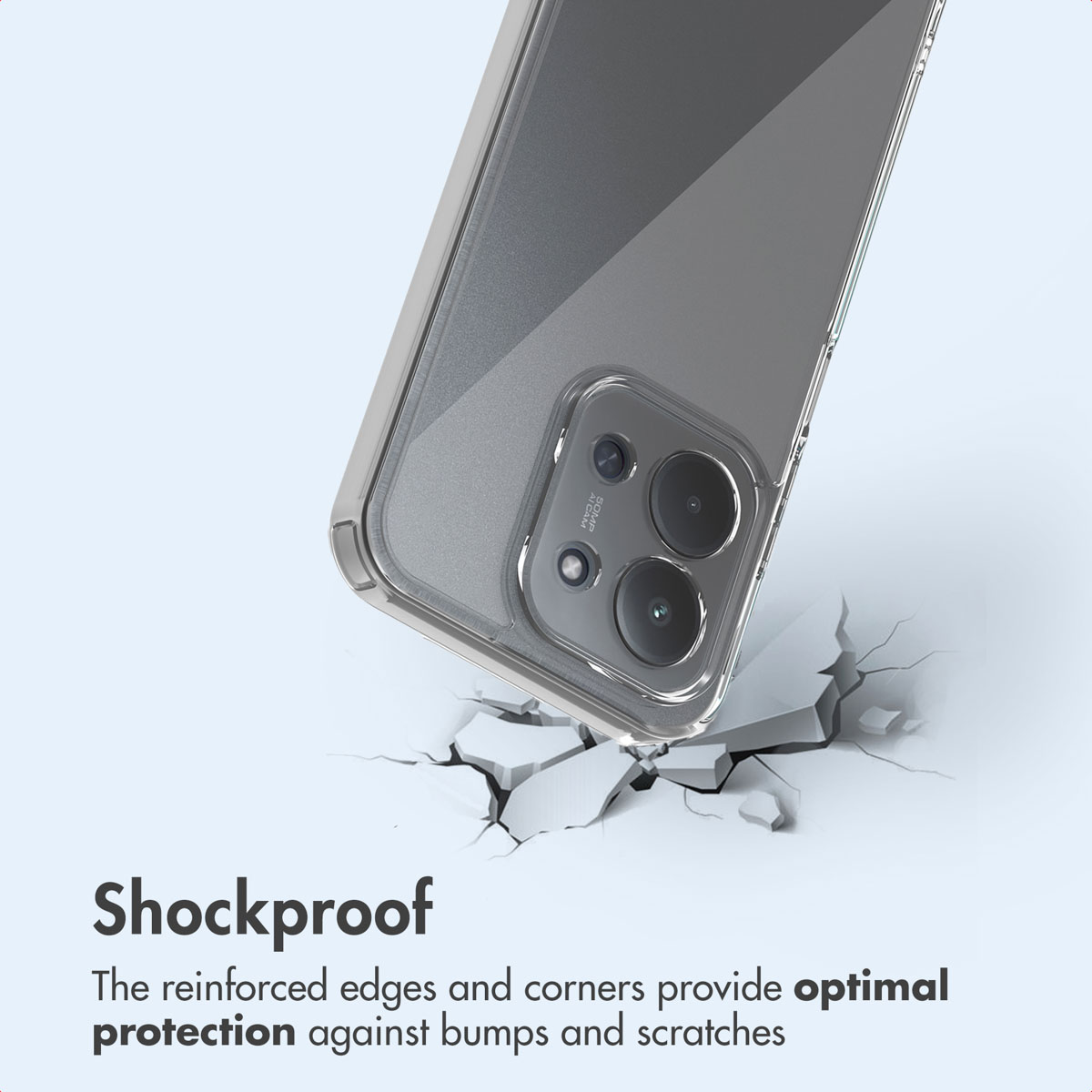 Uno smartphone in una custodia protettiva trasparente sopra una superficie fratturata.
