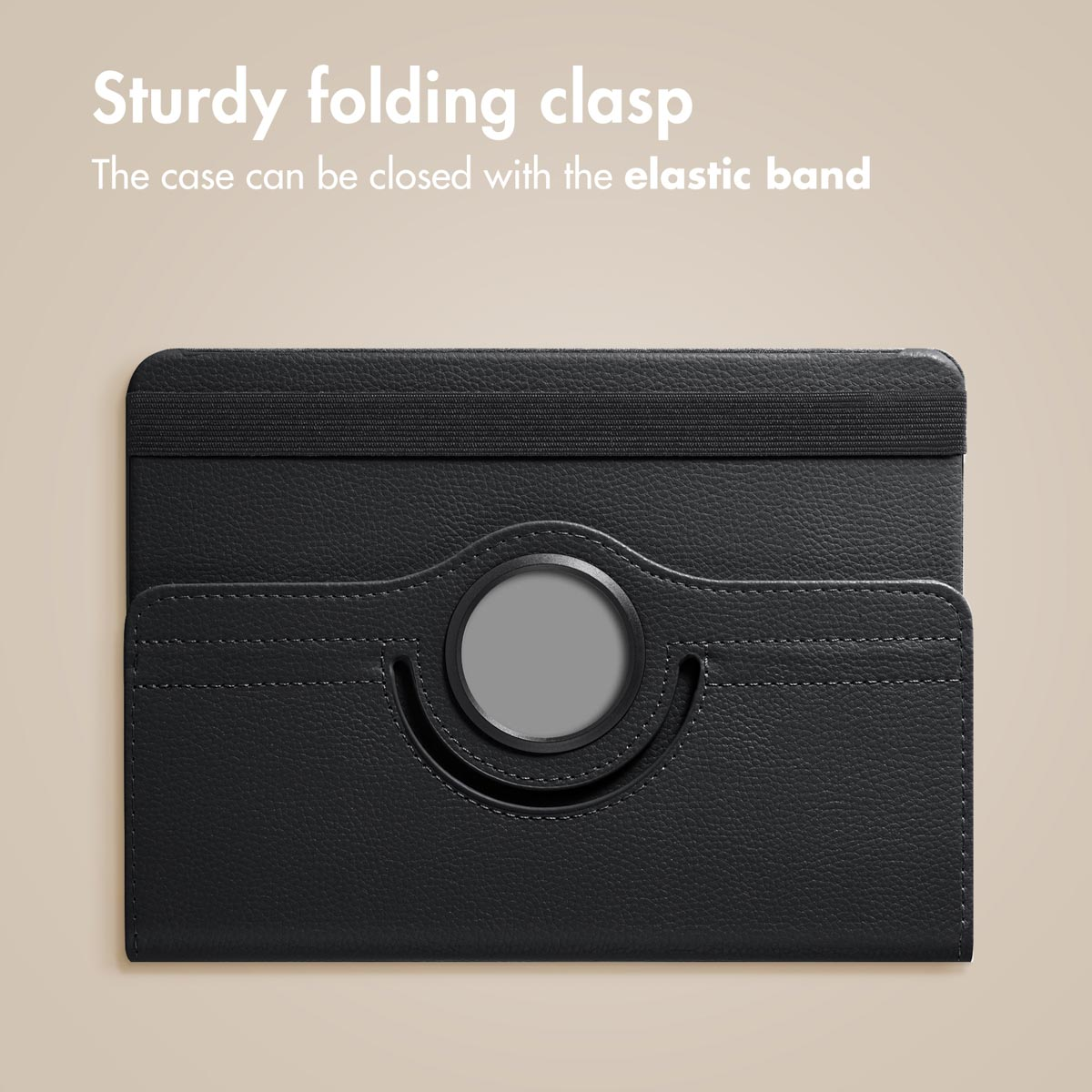 A black leather tablet case with an elastic band and a circular stand mechanism on a beige background.