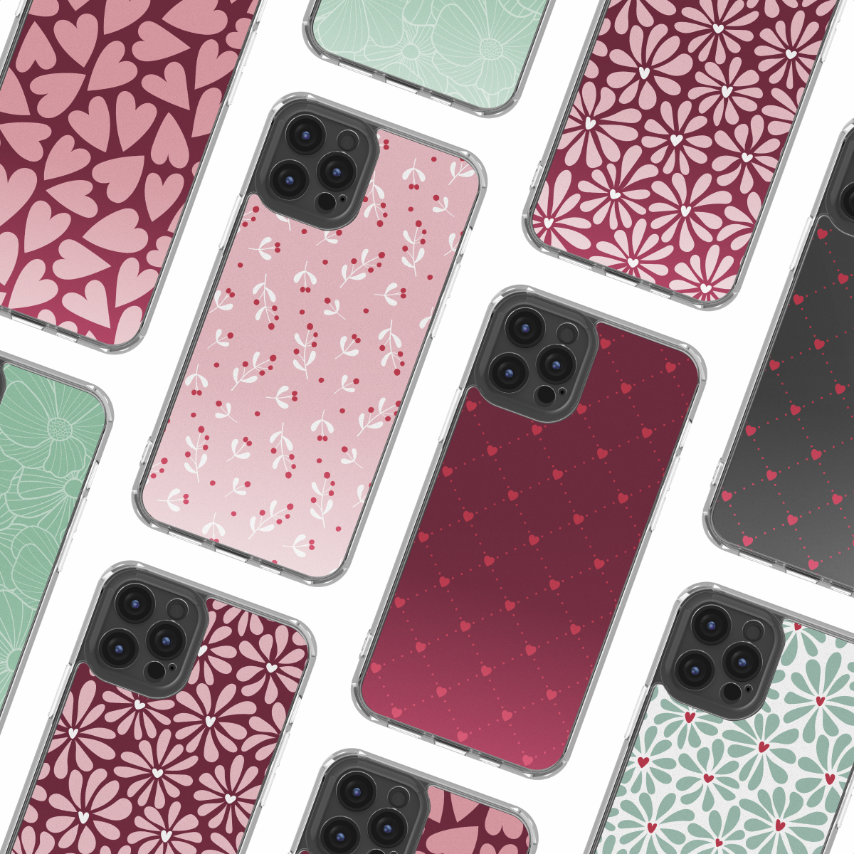 Una colección de teléfonos inteligentes con fundas estampadas con diseños florales y de corazones.