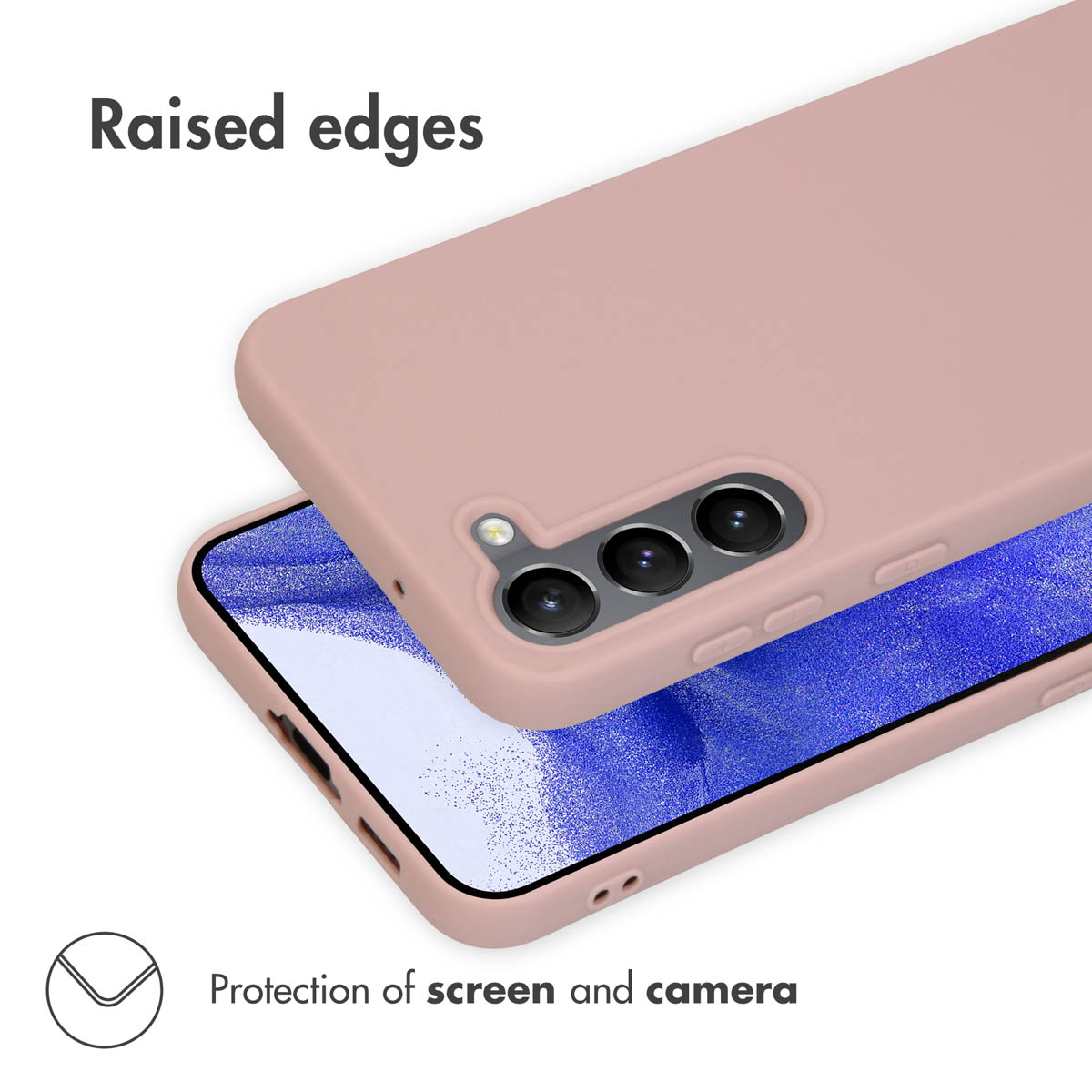 Smartphone rose dans une coque de protection avec bords surélevés pour écran et caméra.