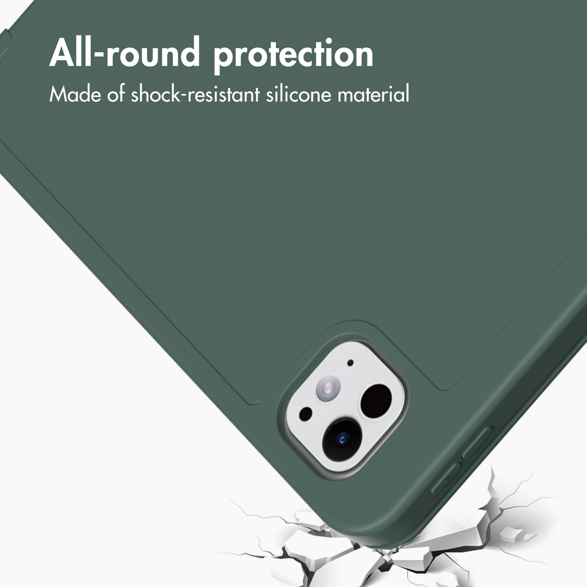 Una custodia per tablet in silicone verde scuro che cade su una superficie bianca screpolata, con testo di protezione.