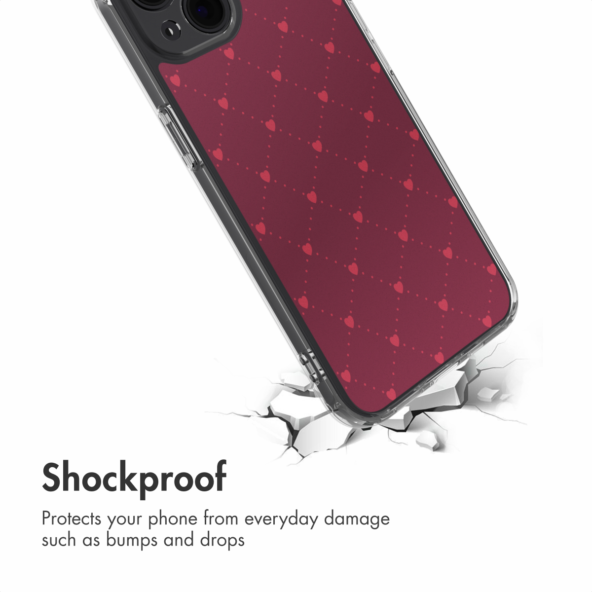 Une coque de téléphone antichoc avec un motif de cœurs rouges sur un sol blanc fissuré.