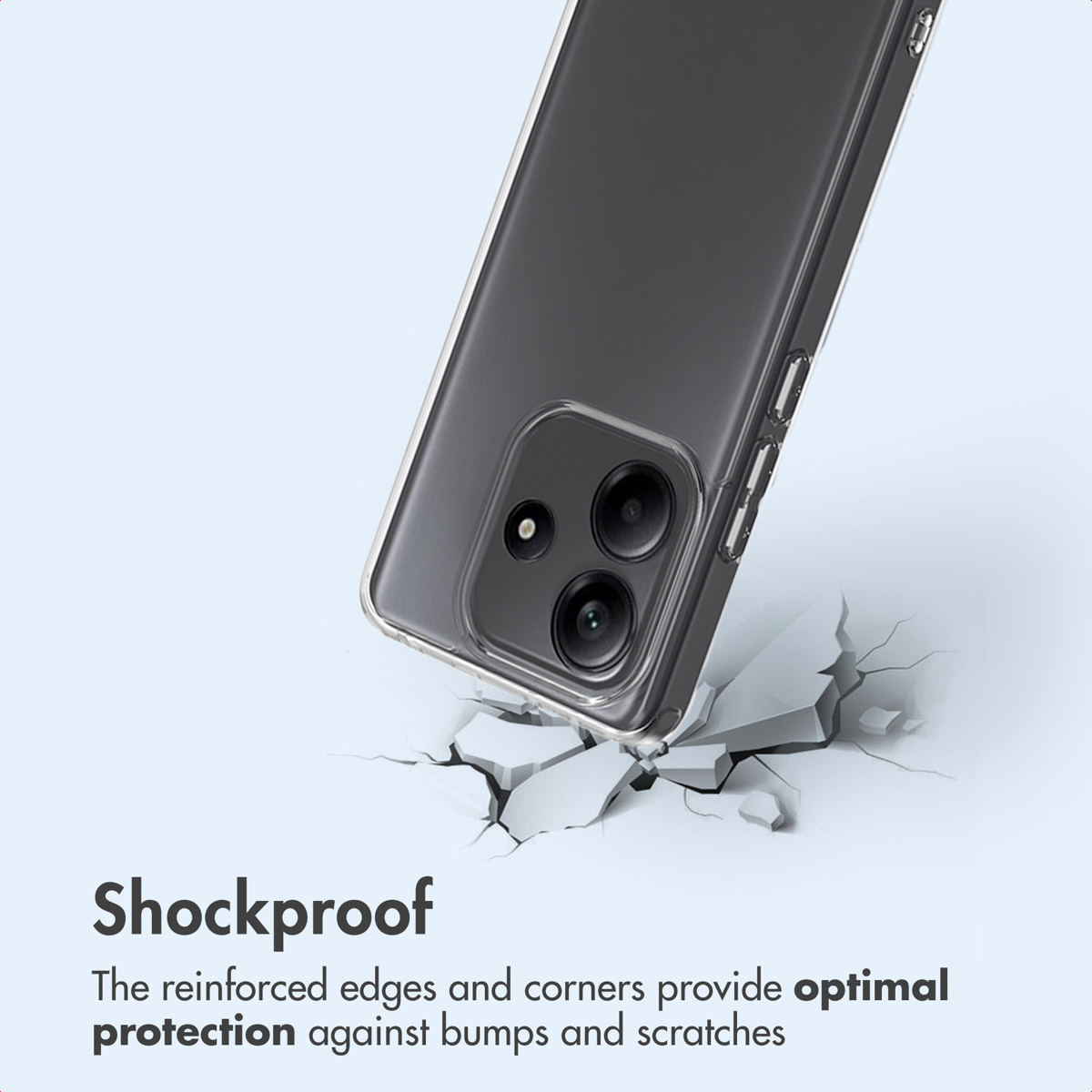 Un smartphone en funda protectora sobre una superficie de hormigón agrietado, con el texto 'Shockproof'.