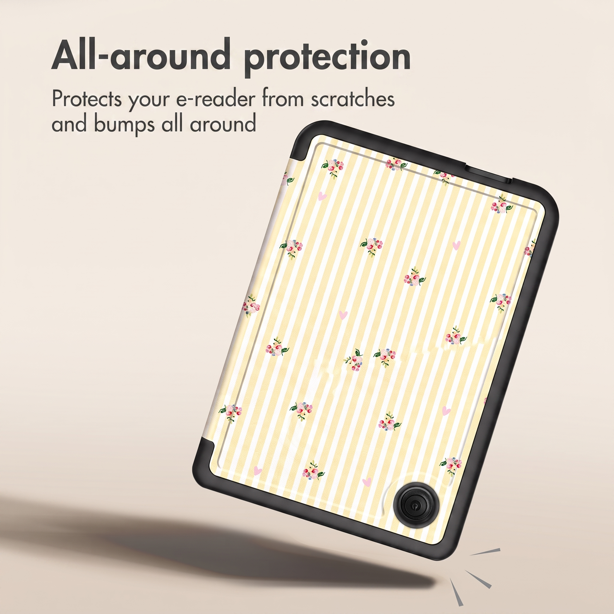 Une liseuse dans une coque de protection à rayures jaunes et petites fleurs, sur fond beige.