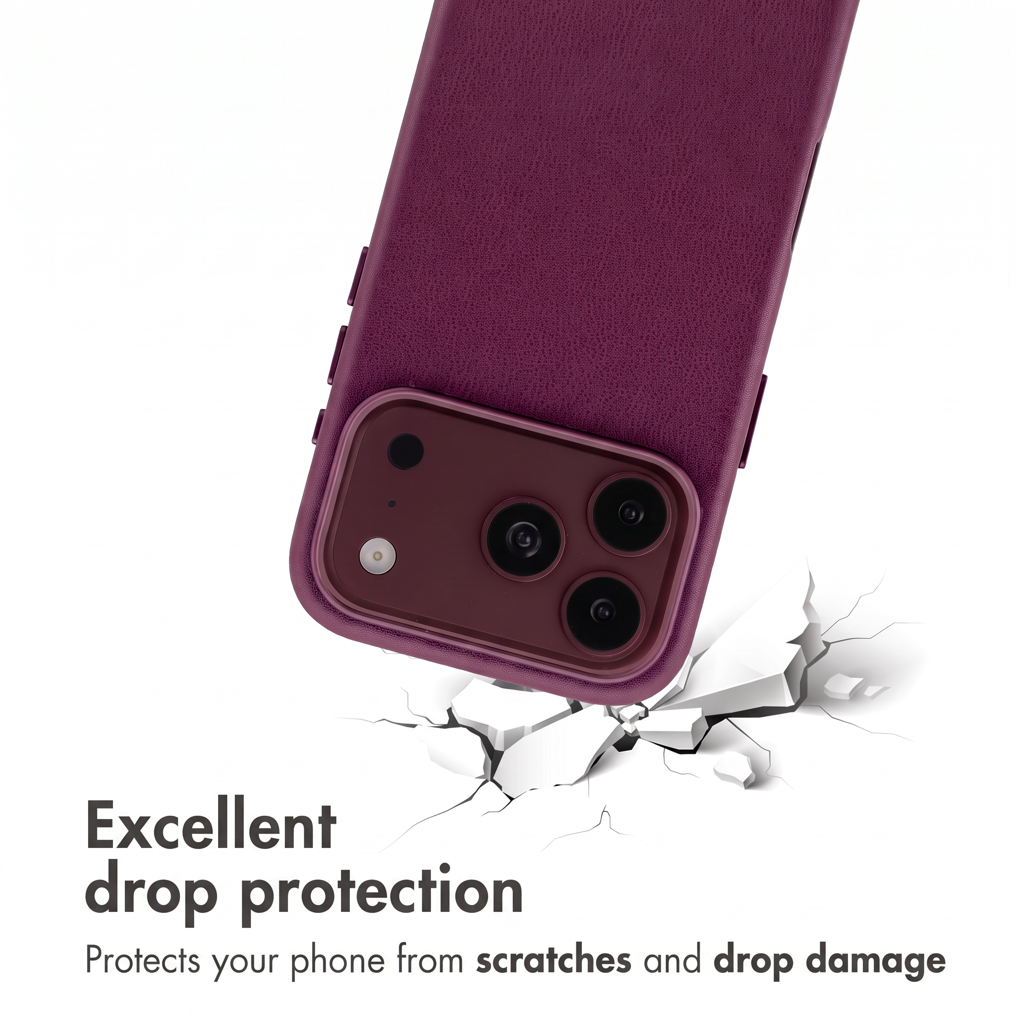 Una cover viola protegge uno smartphone che colpisce una superficie bianca incrinata.