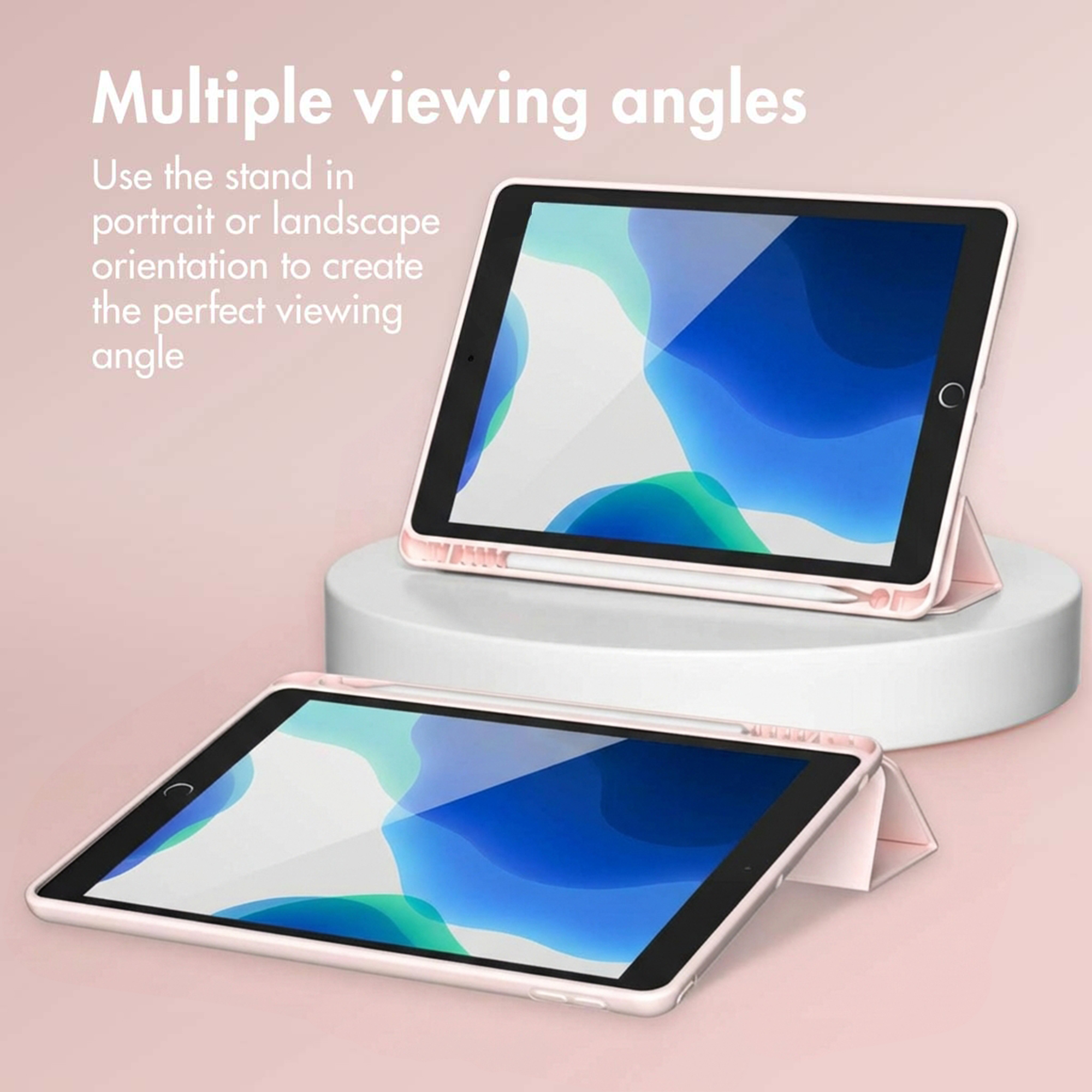 Two pink tablets in cases show abstract blue wallpapers, with one on a white pedestal.
