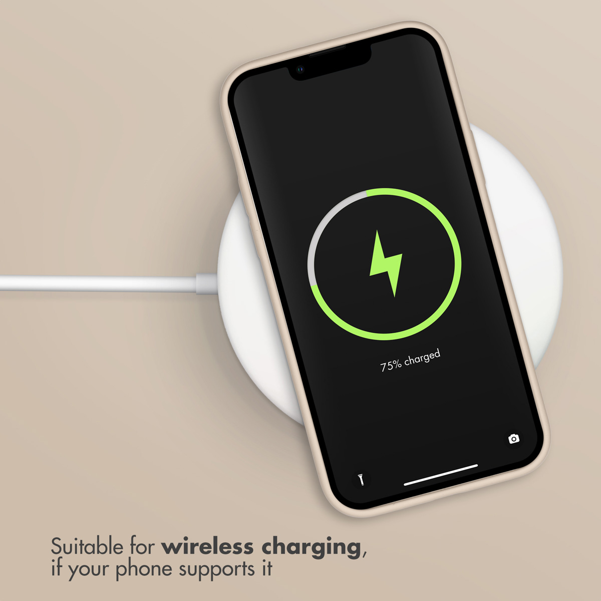 Smartfon ładujący się bezprzewodowo na białej okrągłej podkładce, pokazujący 75 procent baterii.