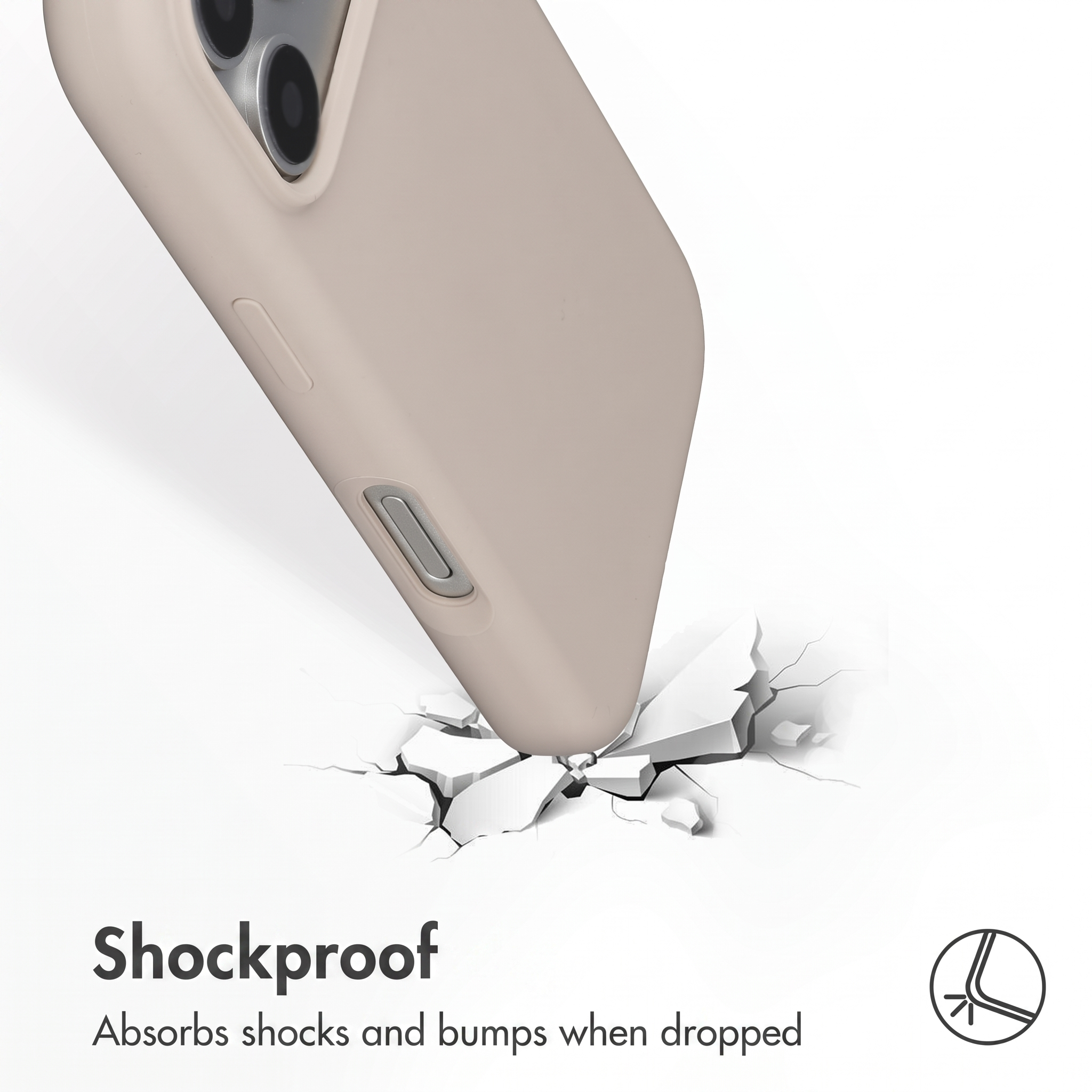 Une coque de téléphone beige impacte une surface blanche fissurée, illustrant la protection antichoc.
