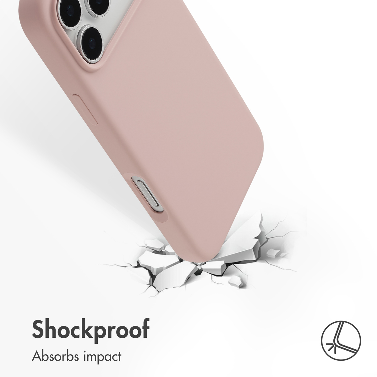 Una funda rosa para teléfono impacta contra una superficie blanca dura, rompiéndola para demostrar protección.
