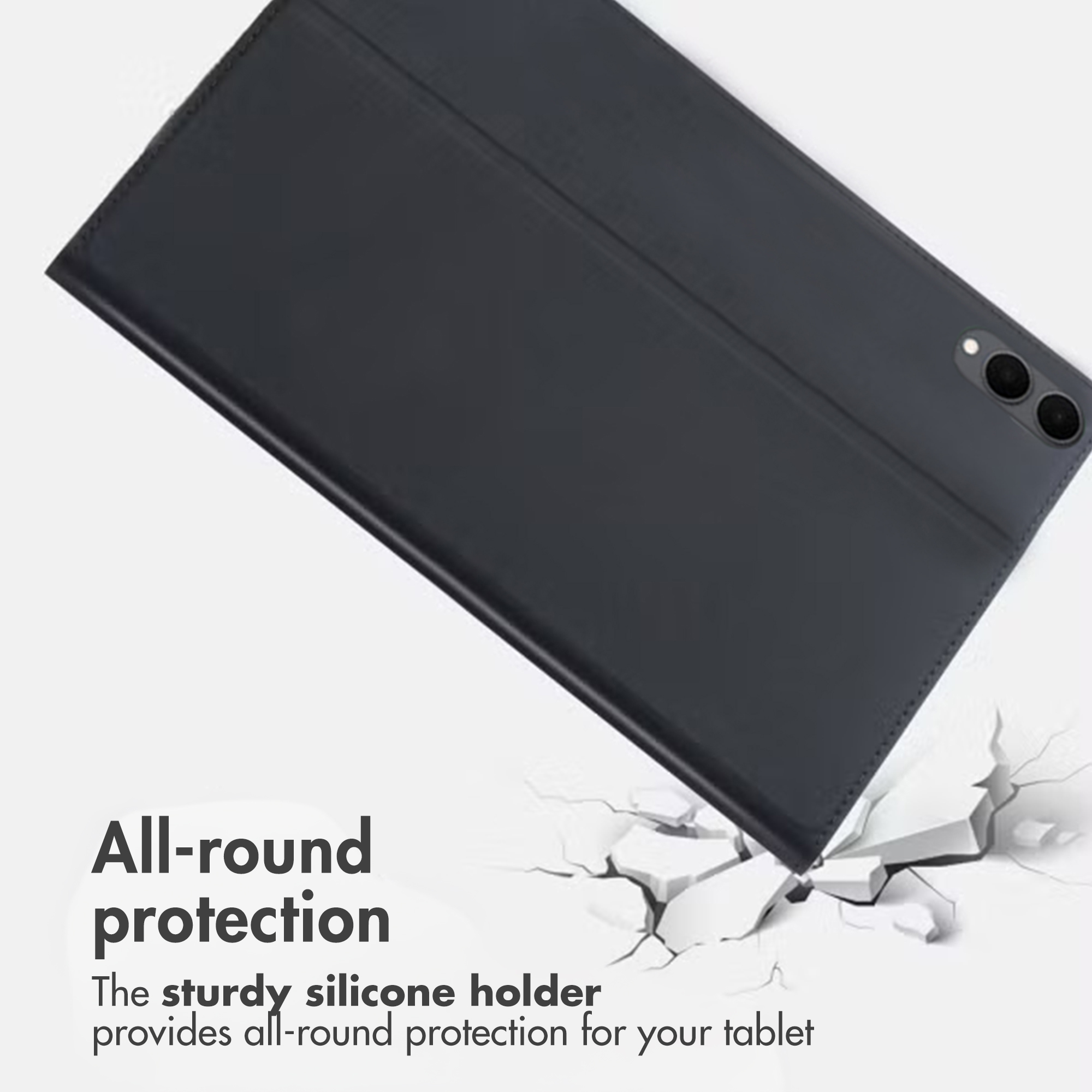 Une tablette noire dans un étui de protection sur une surface fissurée pour illustrer la protection.