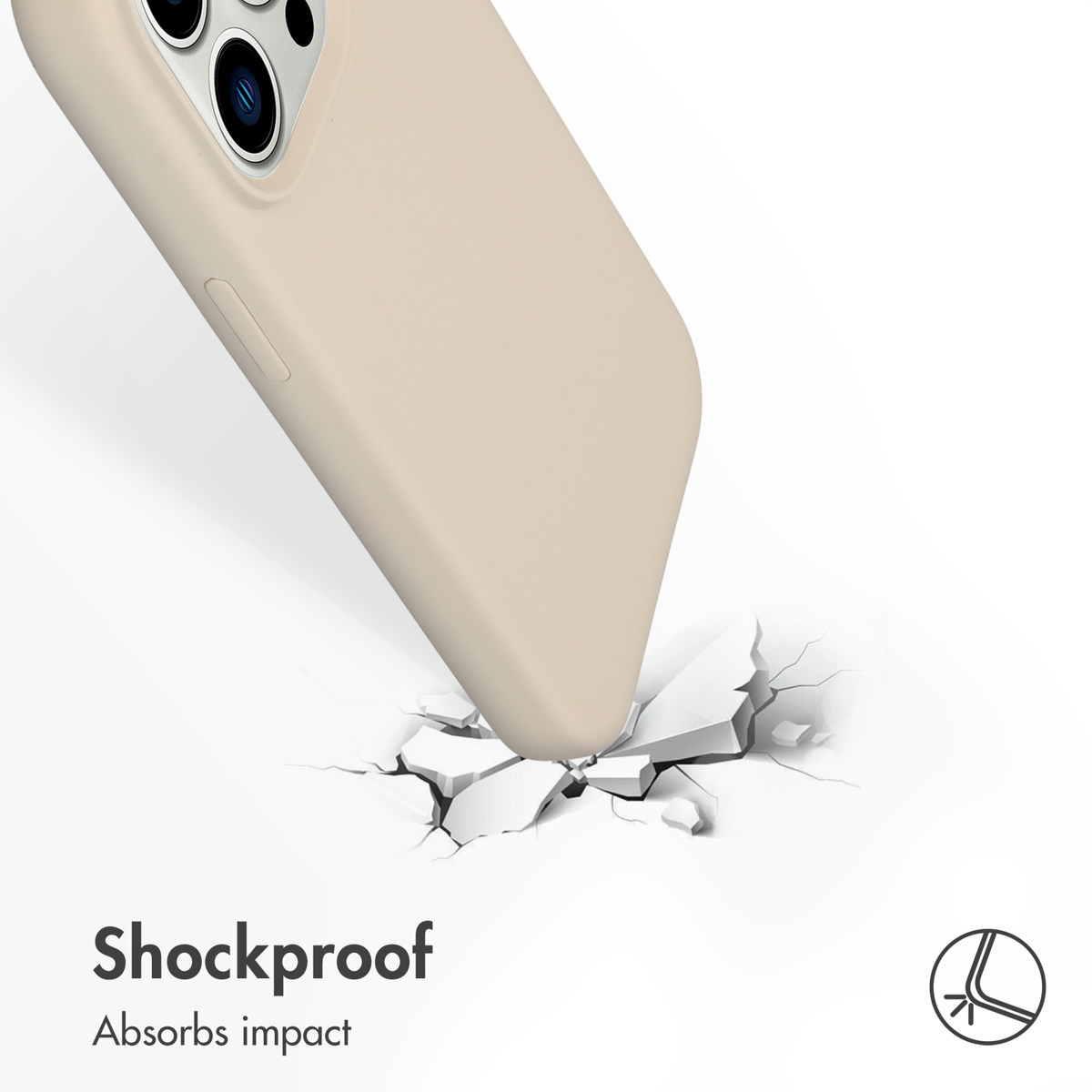 Una cover per telefono beige antiurto assorbe gli urti; l'angolo inferiore preme su una superficie rotta.