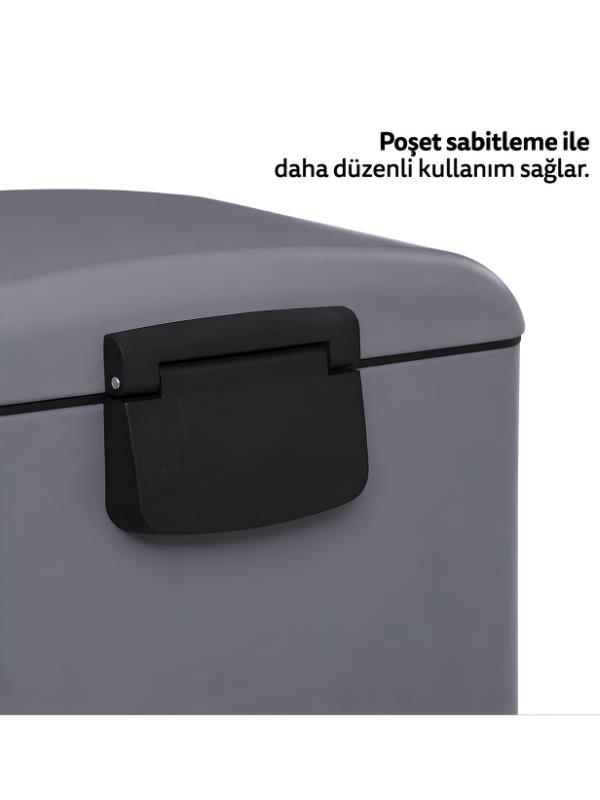 Siyah mandallı gri saklama kutusunun yakın plan görüntüsü ve üzerinde metin.