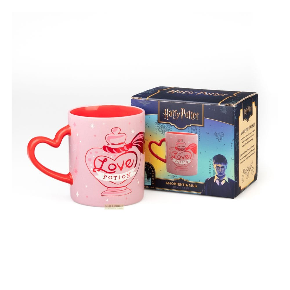 Taza rosa de poción de amor de Harry Potter con asa en forma de corazón y caja a juego.