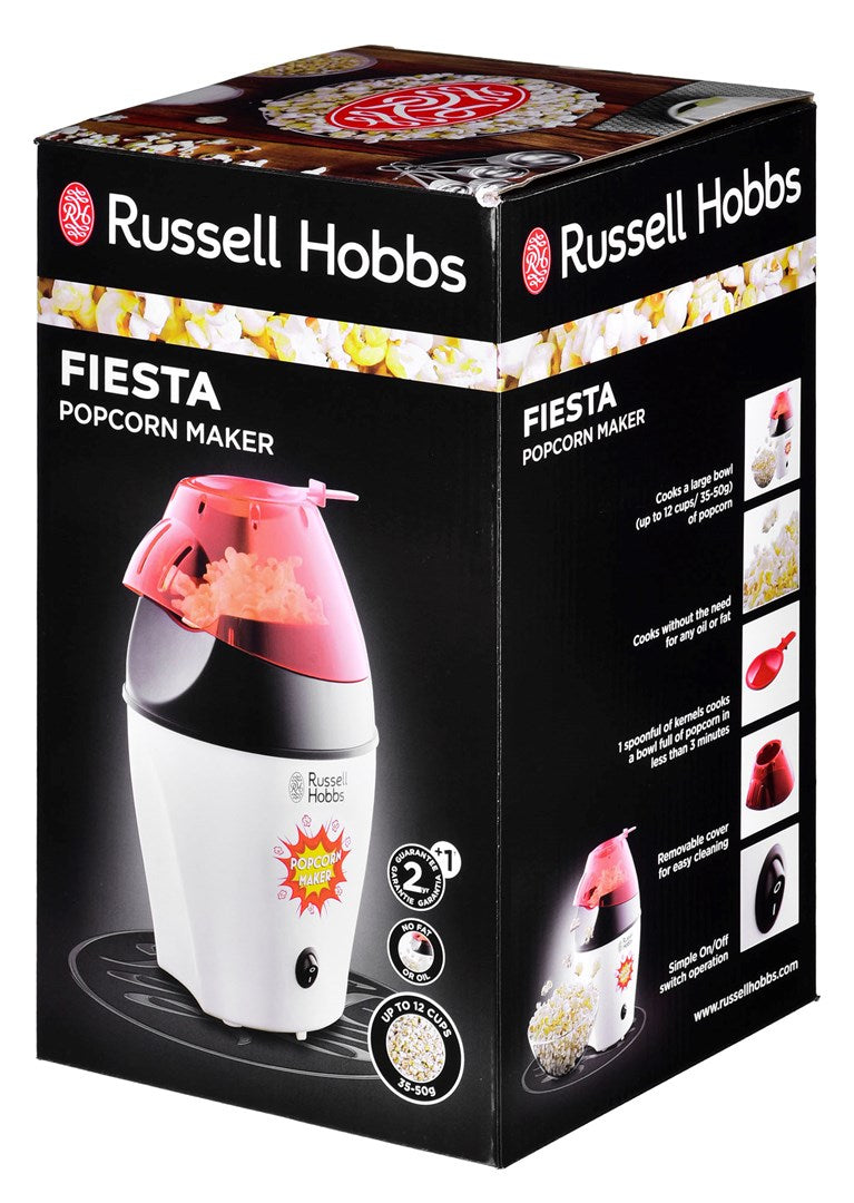 Hacedor de palomitas Russell Hobbs Fiesta en colores blanco y rojo mostrado en un empaque.