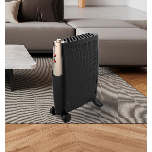 Un elegante calefactor negro con ruedas está sobre una alfombra en una sala de estar moderna.