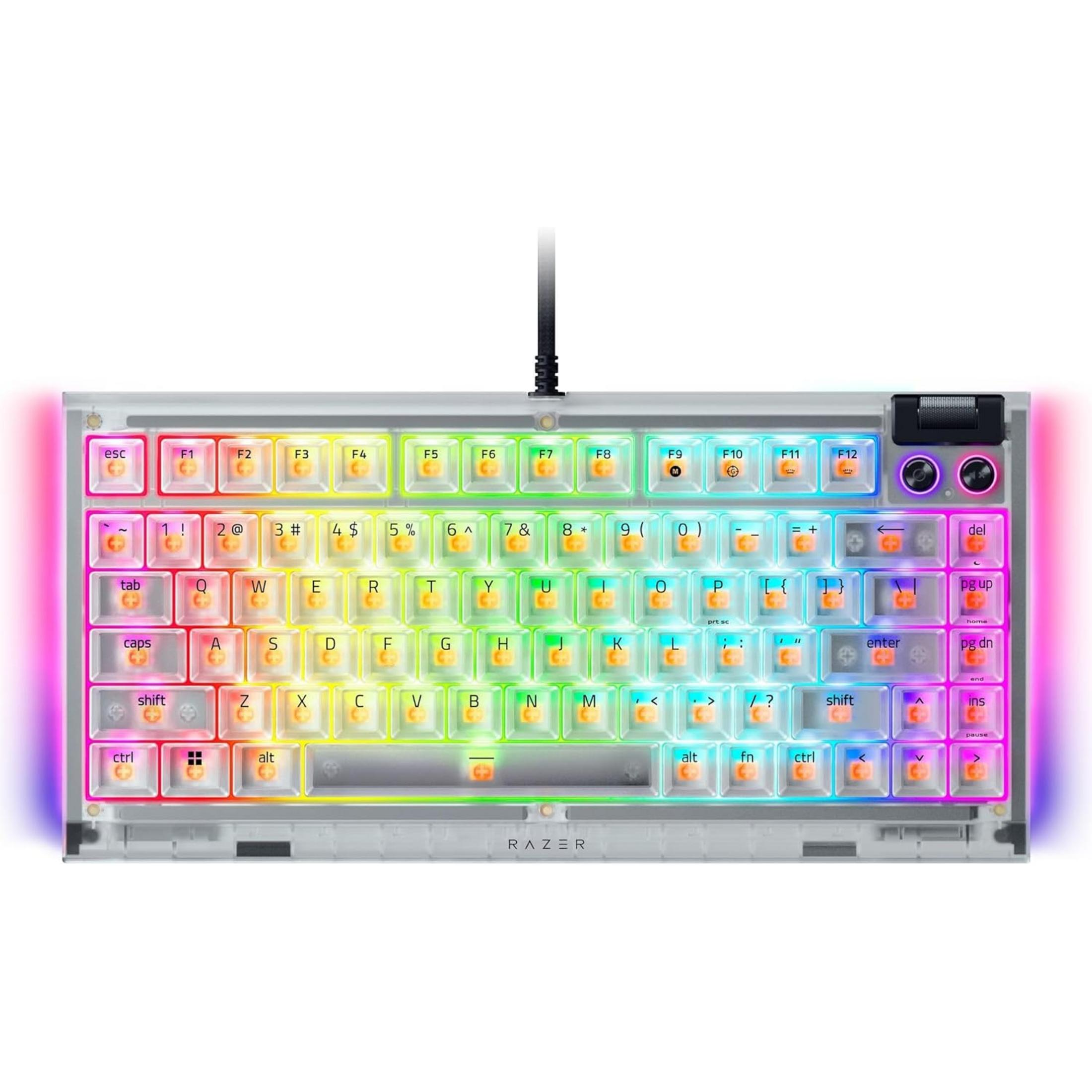 Tastiera meccanica trasparente con vivace retroilluminazione RGB e switch arancioni.