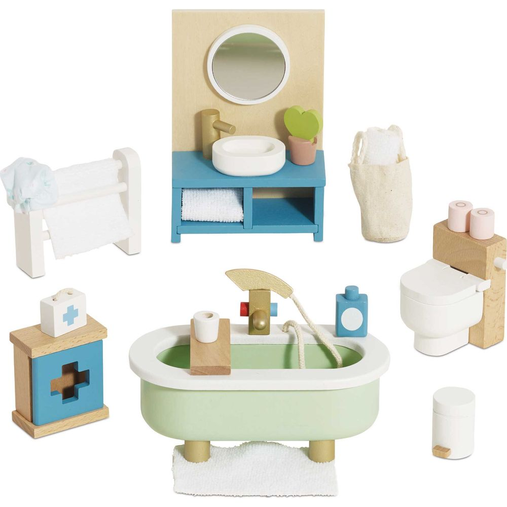 Un set di giocattoli da bagno in miniatura in legno con lavandino, vasca e WC.