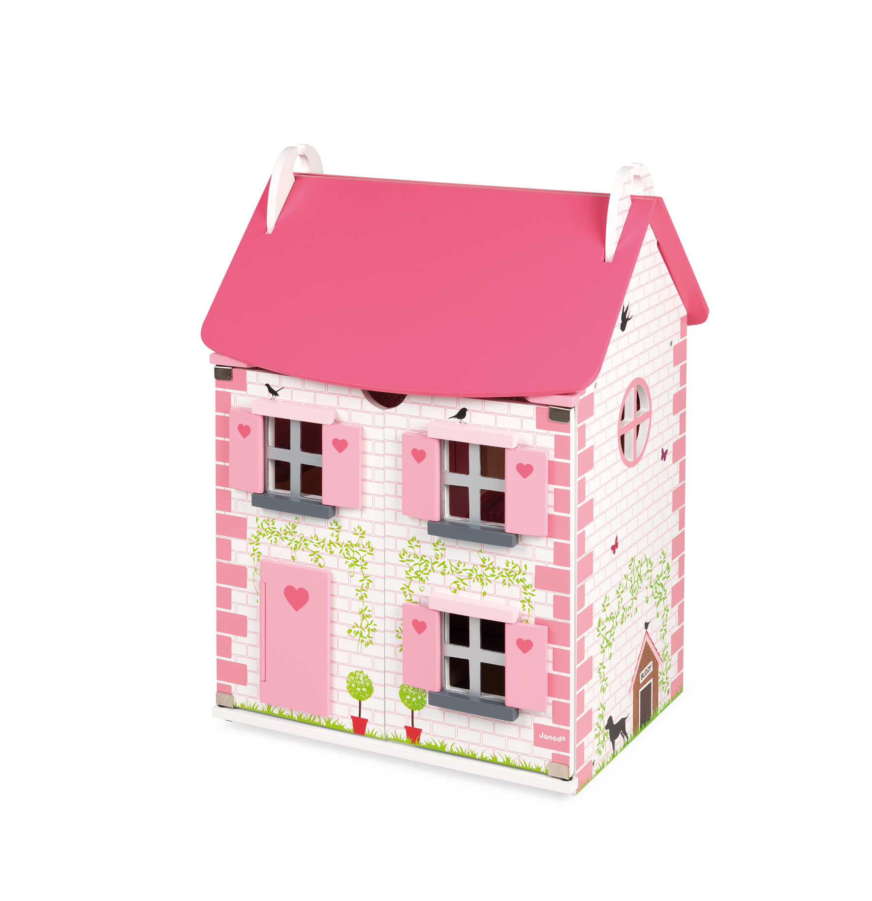 Una casa delle bambole giocattolo in legno rosa e bianca con scuri a cuore, finestre, mattoni e tetto rosa.
