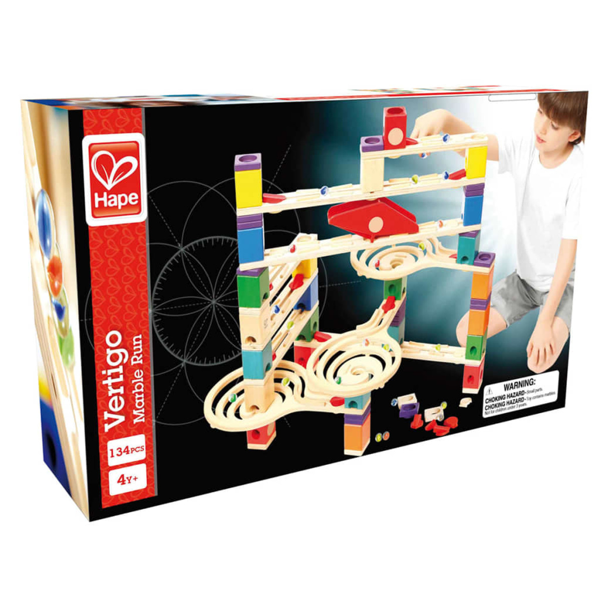 Verpackung der Hape Vertigo Kugelbahn mit bunten Holzteilen und spielendem Kind.