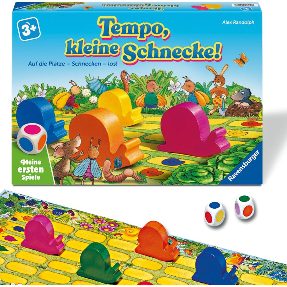 Boîte de jeu de société et composants avec figurines d'escargots en bois et dés sur un chemin jaune.