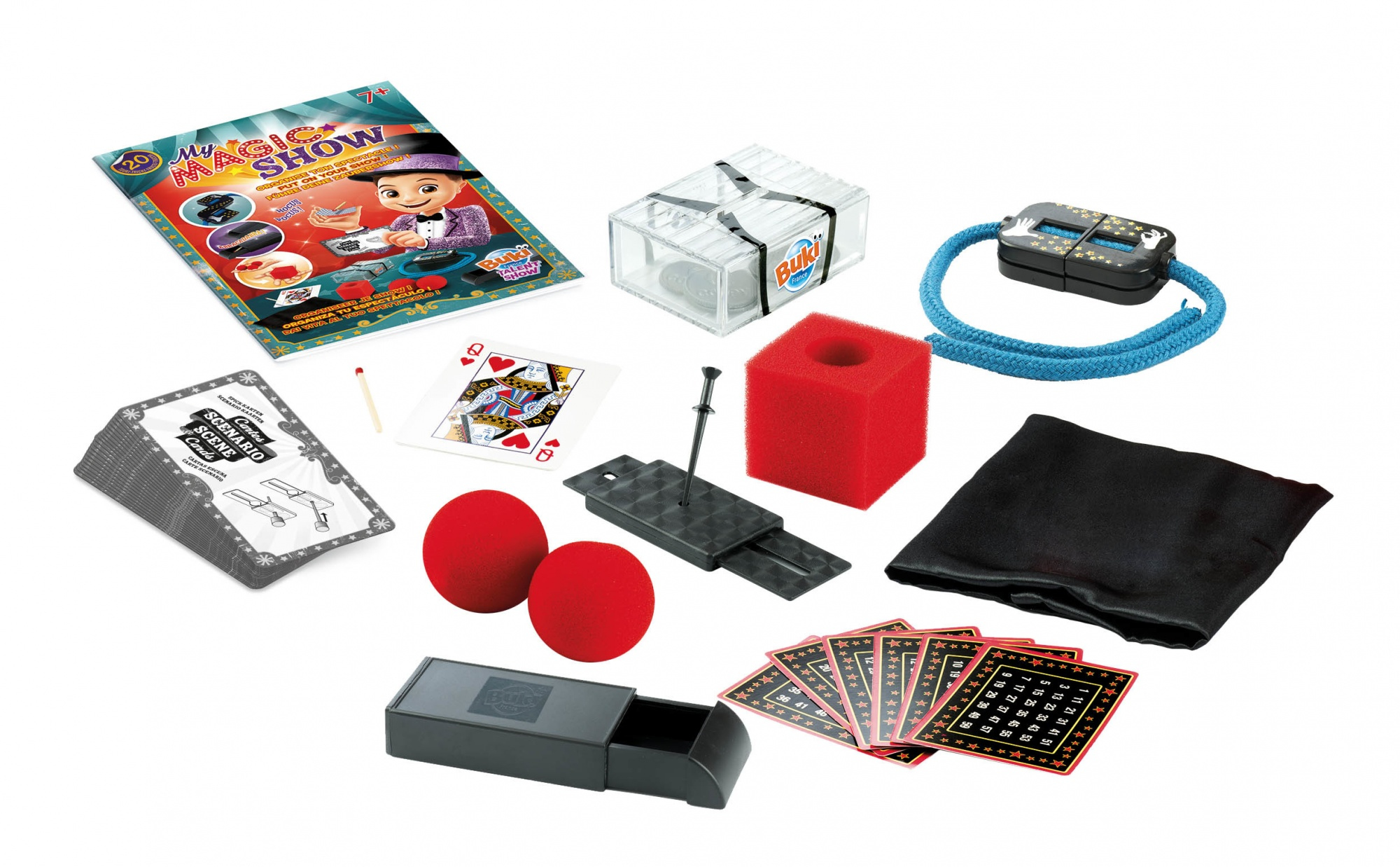 Un kit de magie avec instructions, cartes, boules rouges, une boîte et des accessoires sur fond blanc.