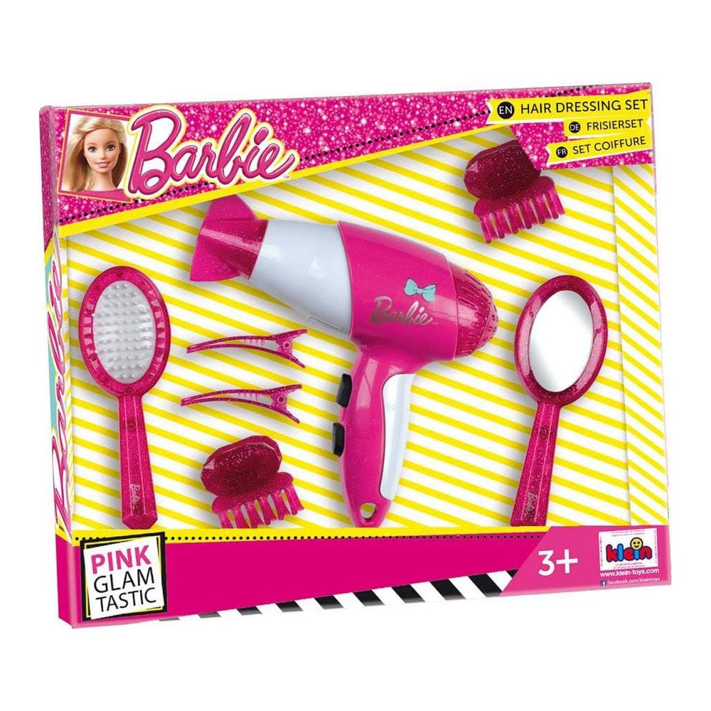 Ein Barbie-Frisierset-Spielzeug mit rosa Haartrockner, Bürste, Spiegel, Clips und Kämmen in der Verpackung.
