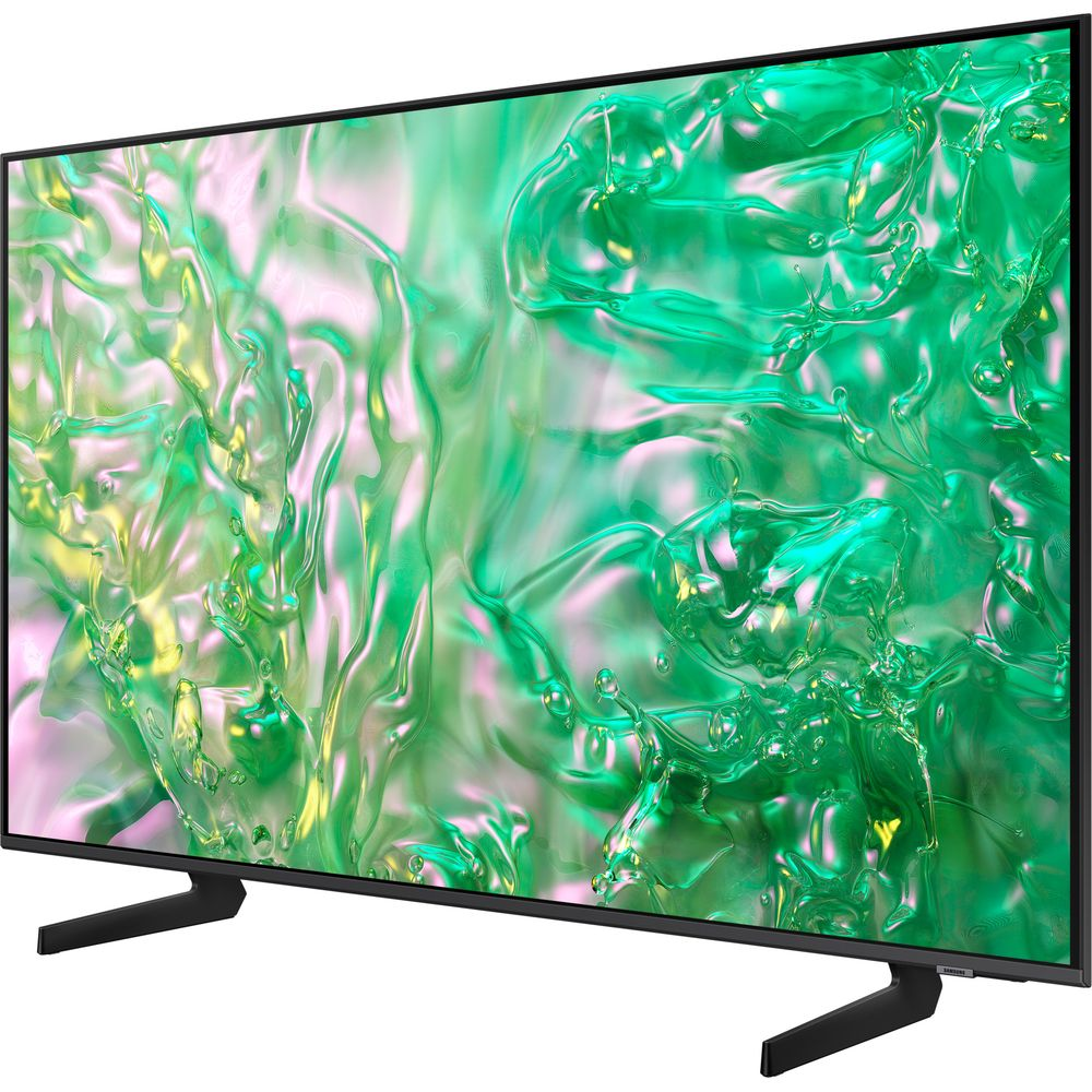 Un téléviseur moderne à cadre noir affiche un motif liquide abstrait vert et rose sur son écran.
