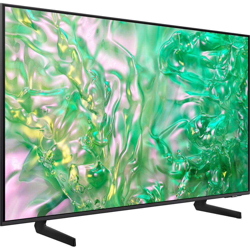 Un téléviseur à écran plat avec un cadre fin affiche des graphiques liquides verts et roses abstraits.