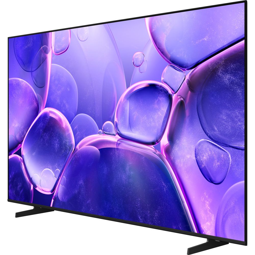 Un téléviseur élégant à cadre noir affiche un motif abstrait de bulles violettes et bleues.