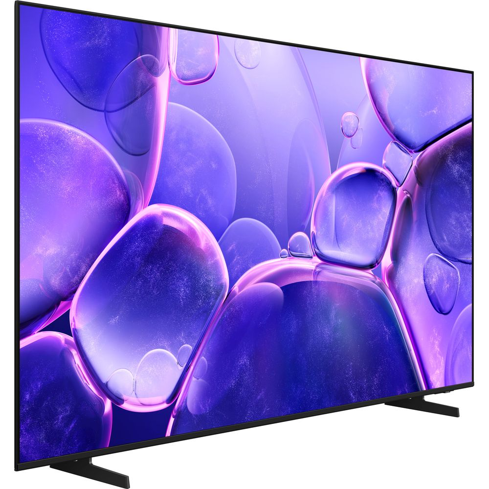 Un téléviseur moderne à cadre noir affiche un motif abstrait de bulles violettes sur son écran.