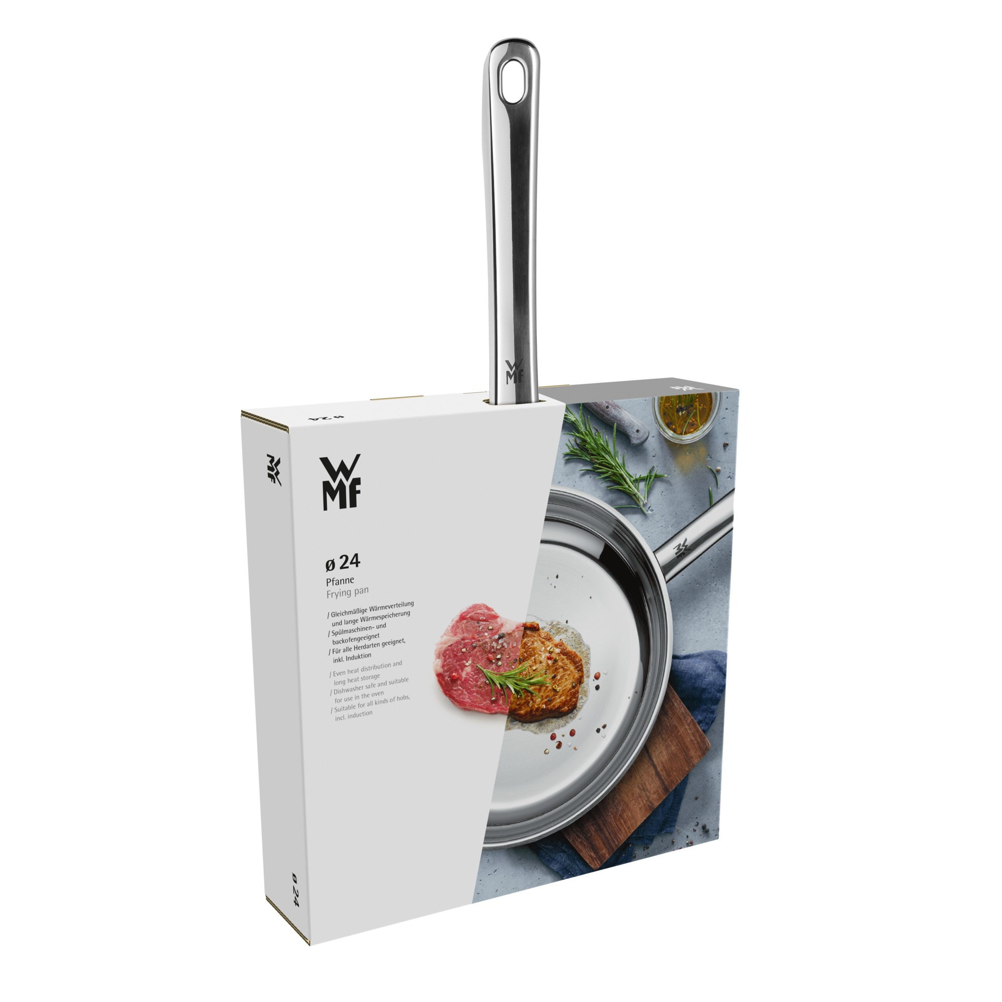 Eine Edelstahl-Bratpfanne mit WMF-Logo in der Verpackung, daneben Fleisch und Kräuter auf einem Bild.