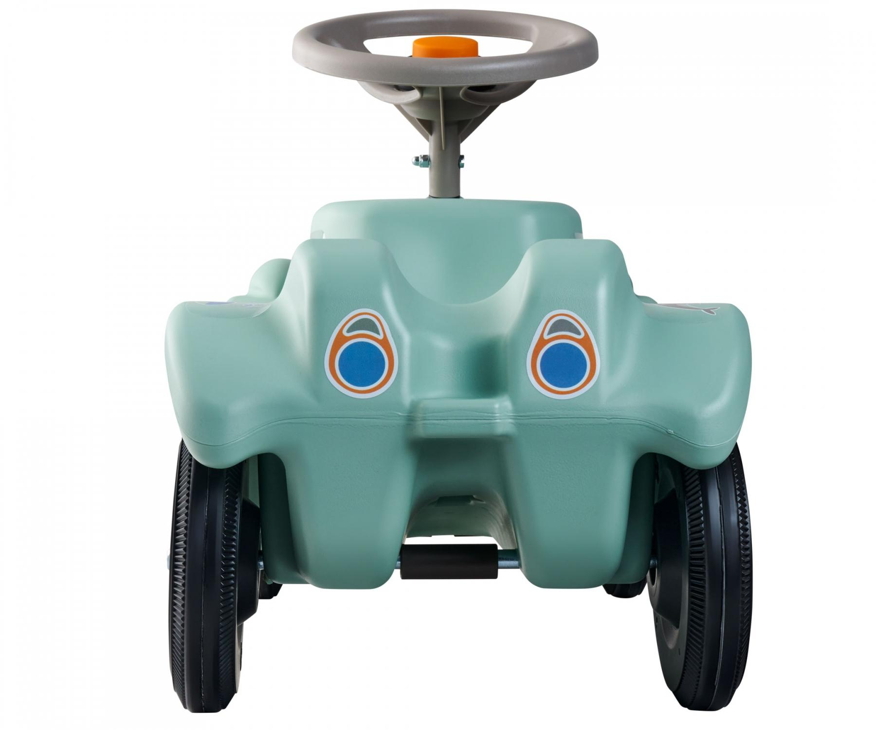 Frontansicht eines mintgrünen Spielzeugautos aus Plastik mit grauem Lenkrad und schwarzen Rädern.