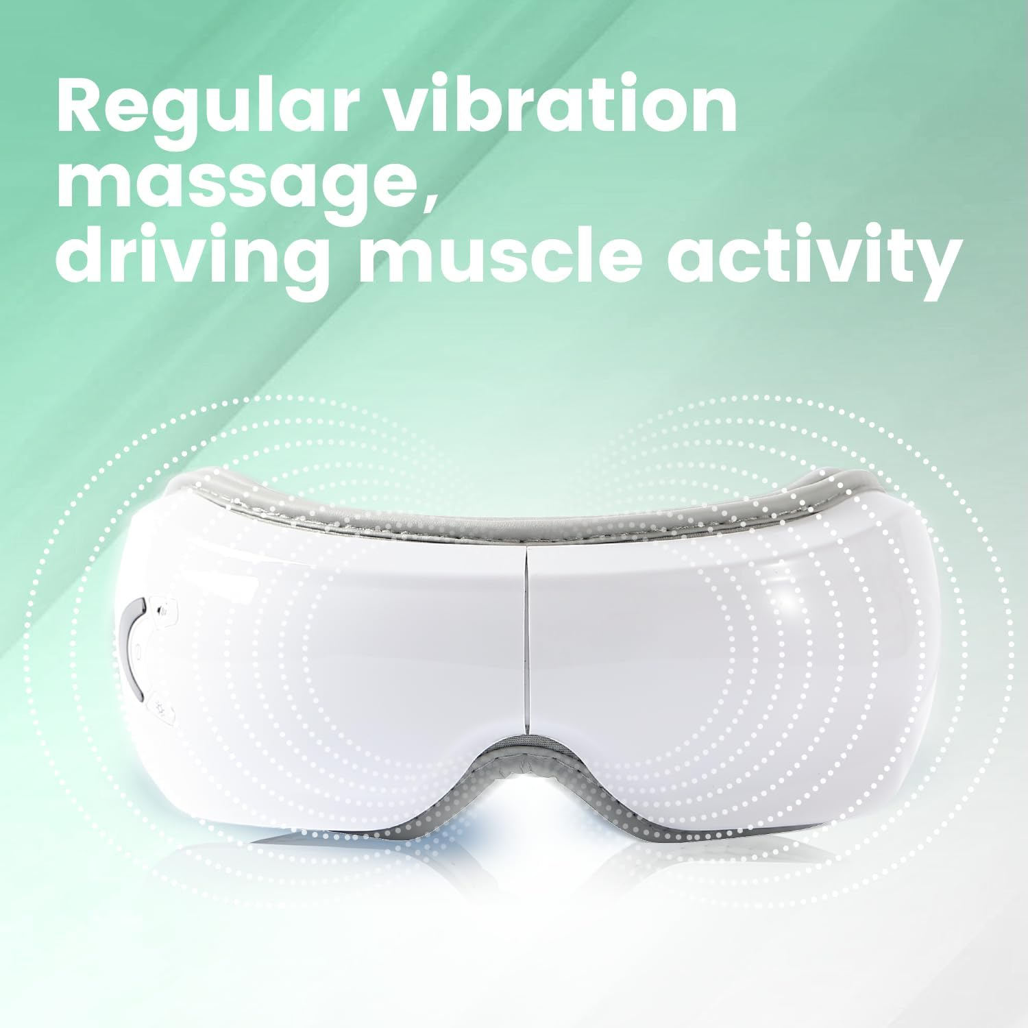 Weißes elektrisches Augenmassagegerät mit Vibrationswellen und grünem Hintergrund.