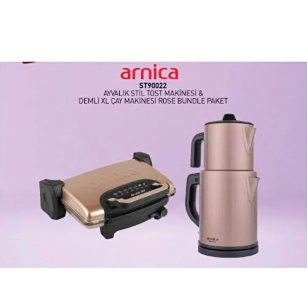 Mor arka planda Arnica rose tost makinesi ve çift demlikli çay makinesi seti.