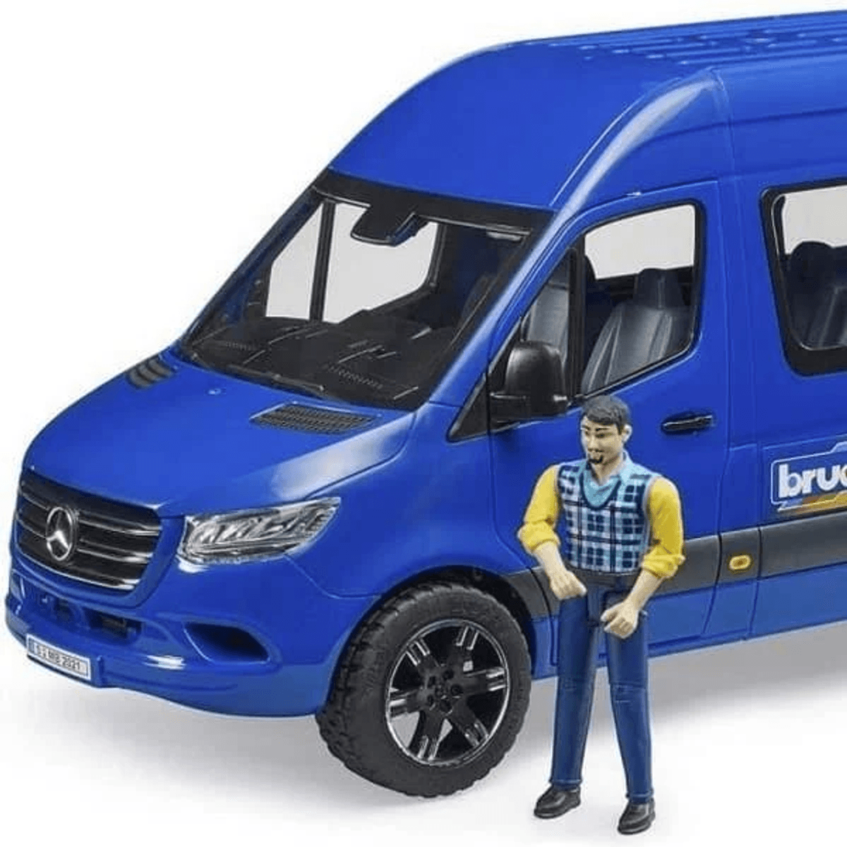 Una furgoneta azul de juguete con una pequeña figura masculina de pie junto a la puerta delantera.