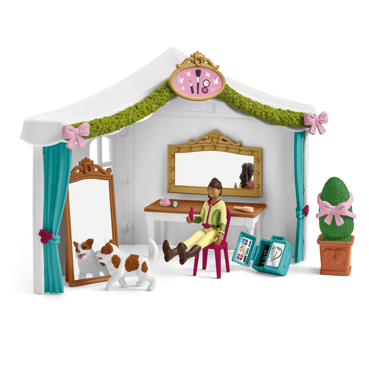 Eine Spielfigur in einer Schminkstube mit Spiegel, Stuhl, Kosmetik und einem Hund.