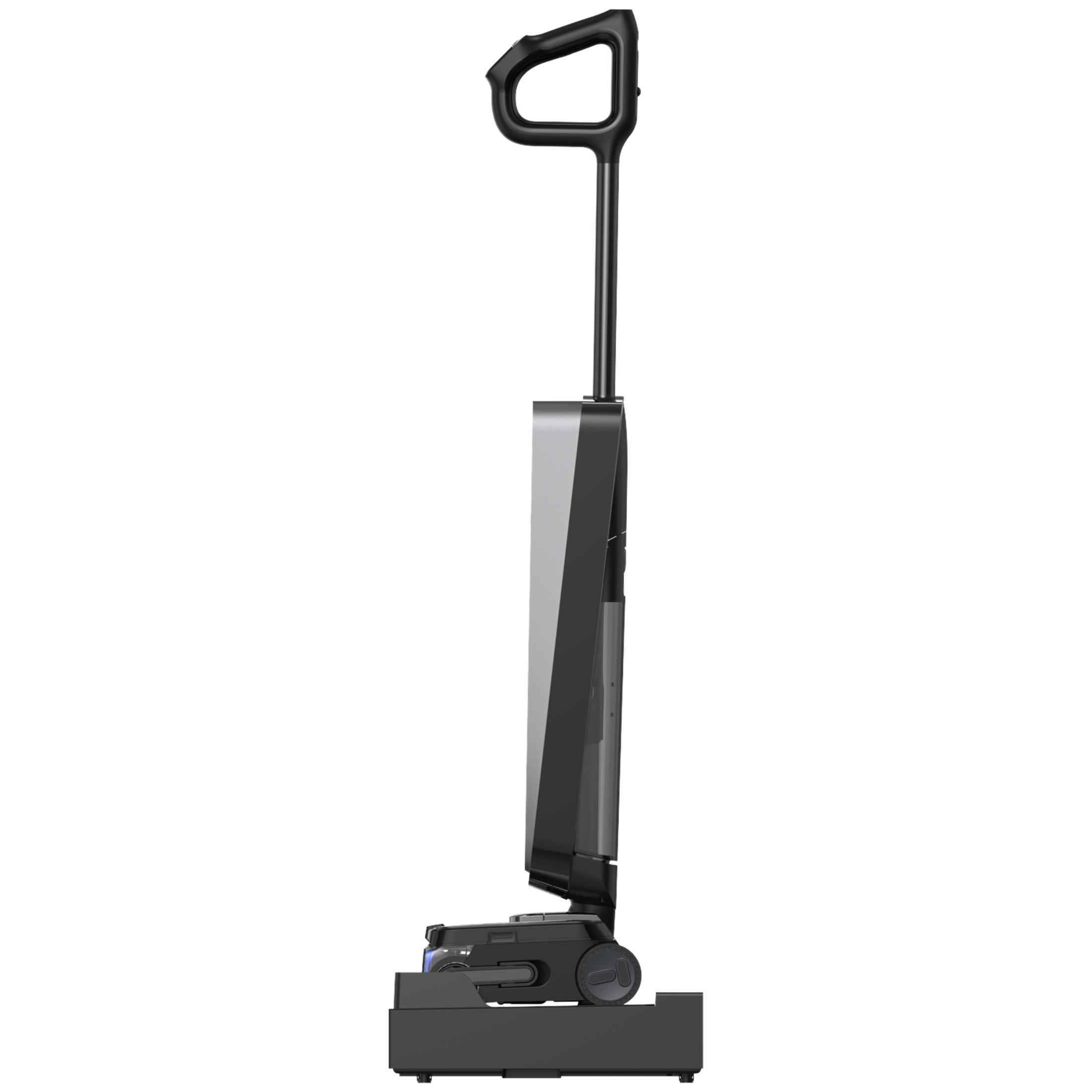 Vue de profil d'un aspirateur balai noir sur sa base de charge, sur fond blanc.