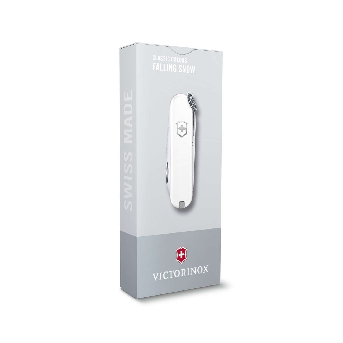 SWISS MADE ve Classic Colors Falling Snow yazılı beyaz bir Victorinox çakı kutusu.