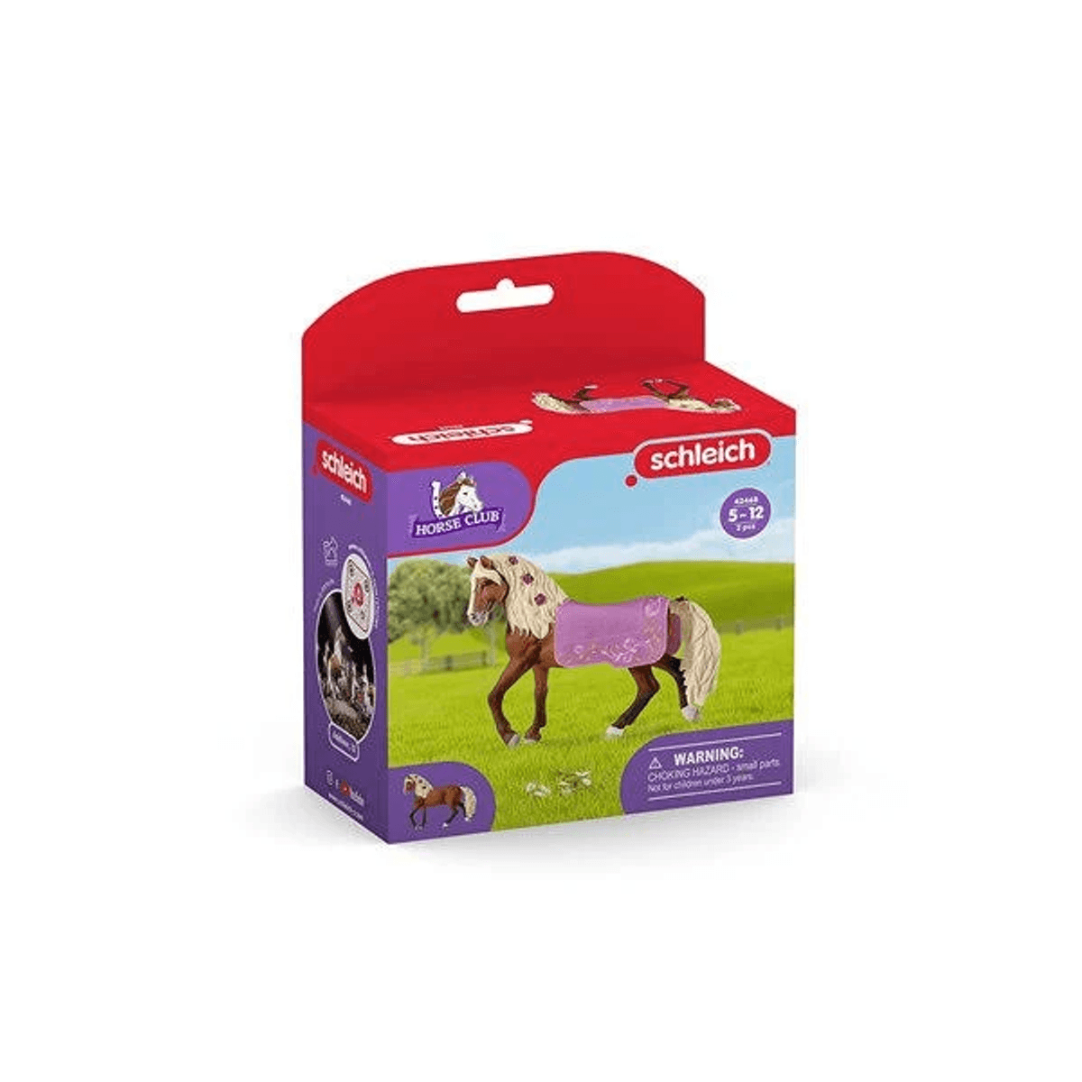 Verpackung der Schleich Horse Club Figurine mit einem braunen Pferd mit rosa Decke auf einer Wiese.
