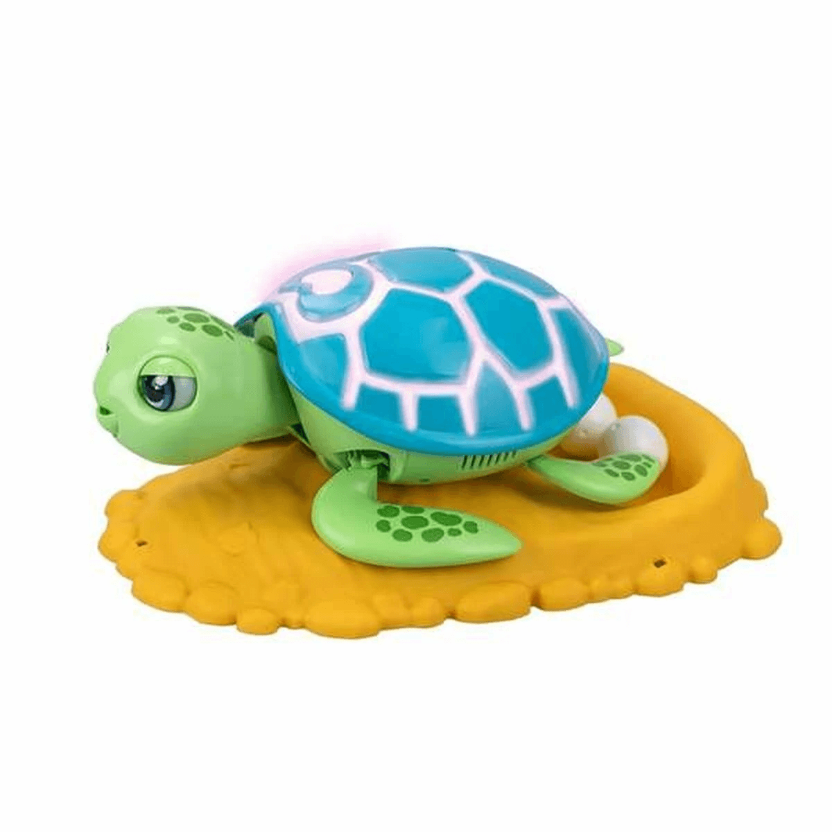 Una tortuga de juguete verde con caparazón azul sobre una base amarilla con huevos blancos.