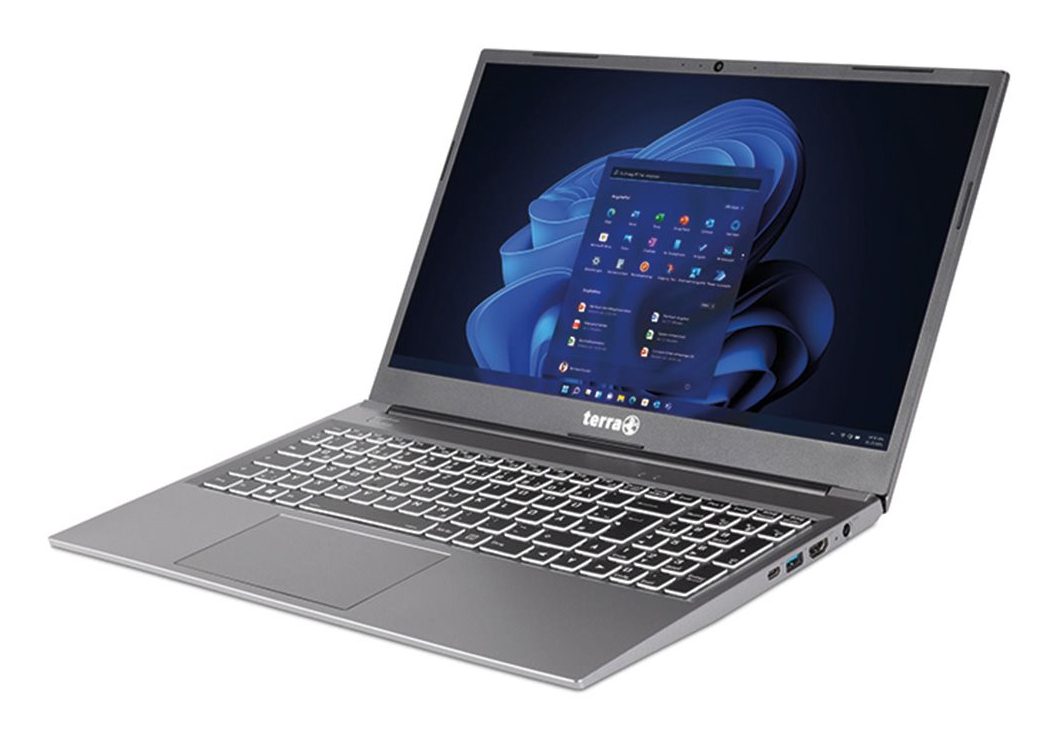 Un ordenador portátil Terra gris con teclado iluminado y menú de inicio de Windows 11.