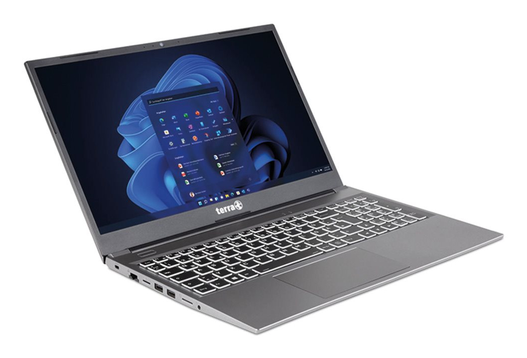 Un ordenador portátil Terra gris con teclado retroiluminado y fondo de pantalla azul de Windows sobre fondo blanco.